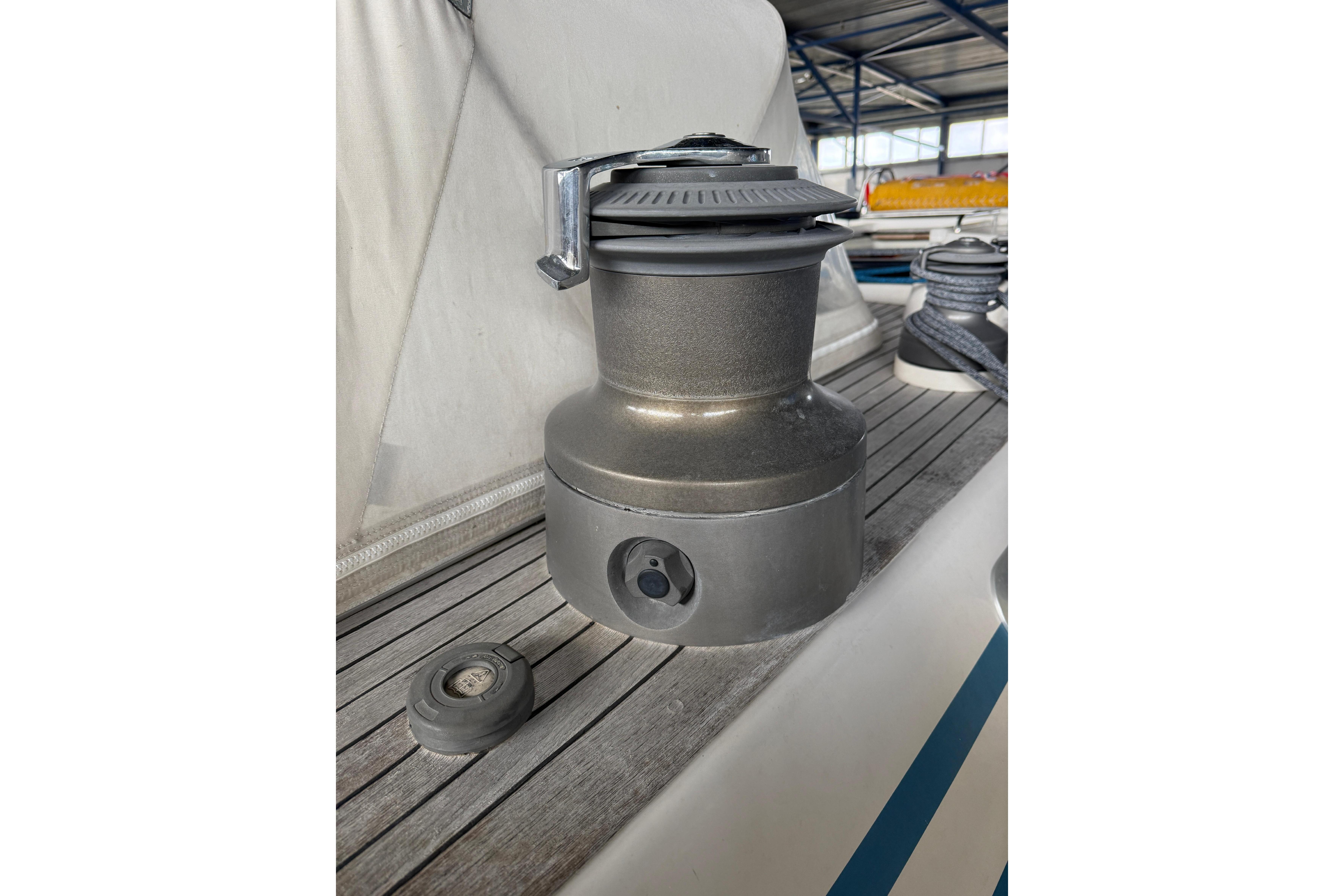 Winch on 1997 Nautor Swan 56R yacht deck, showcasing marine equipment.