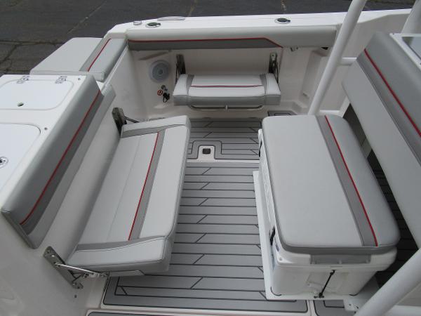 2025 Solara S-250 CW boat interior with gray seating and red accents.