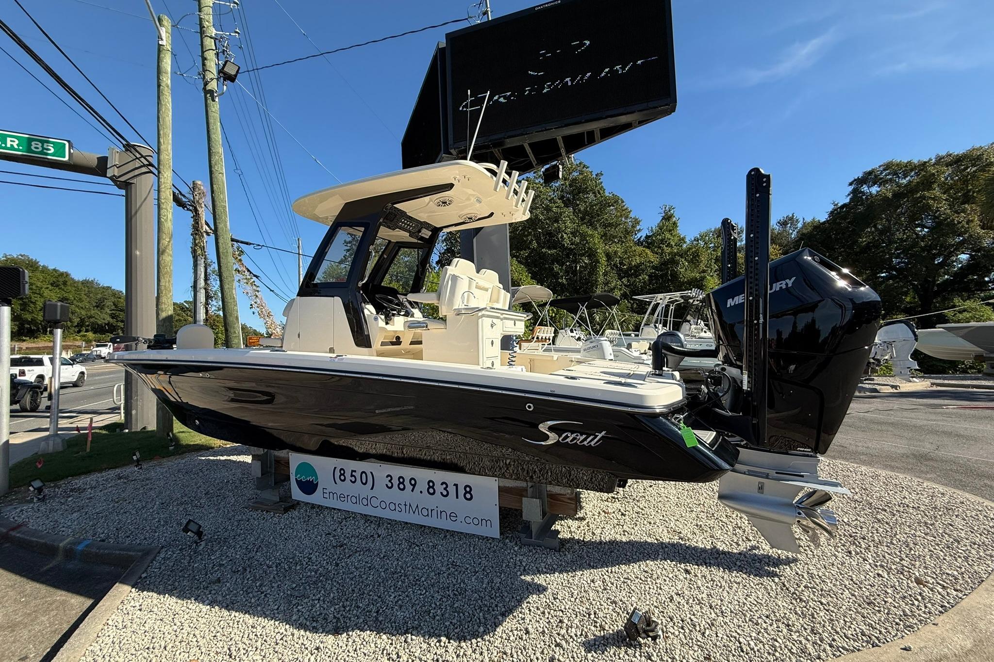 2026 Scout 261 XSS boat displayed at Emerald Coast Marine dealership.
