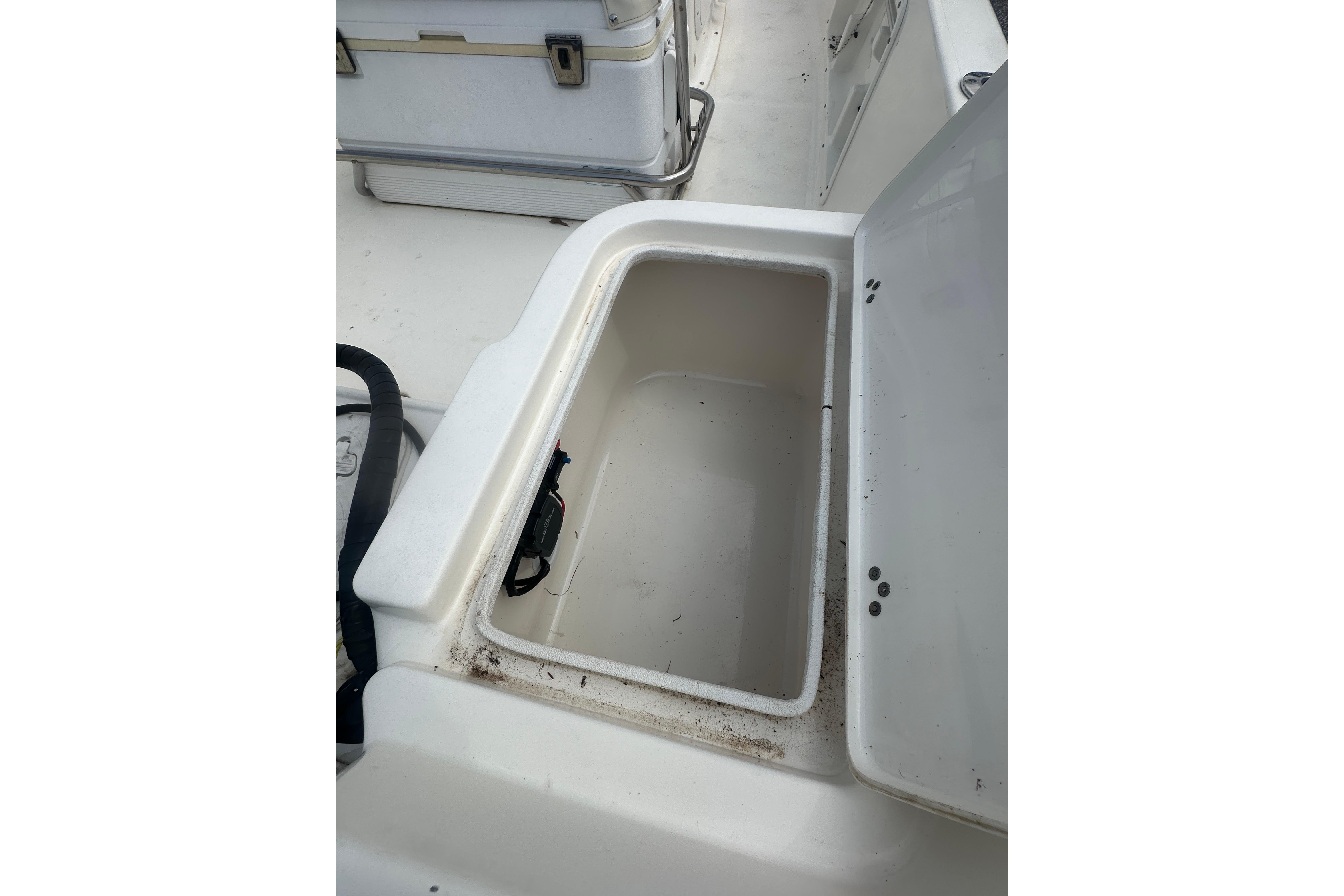 Open storage compartment on 2018 Key West 1720 Center Console boat.