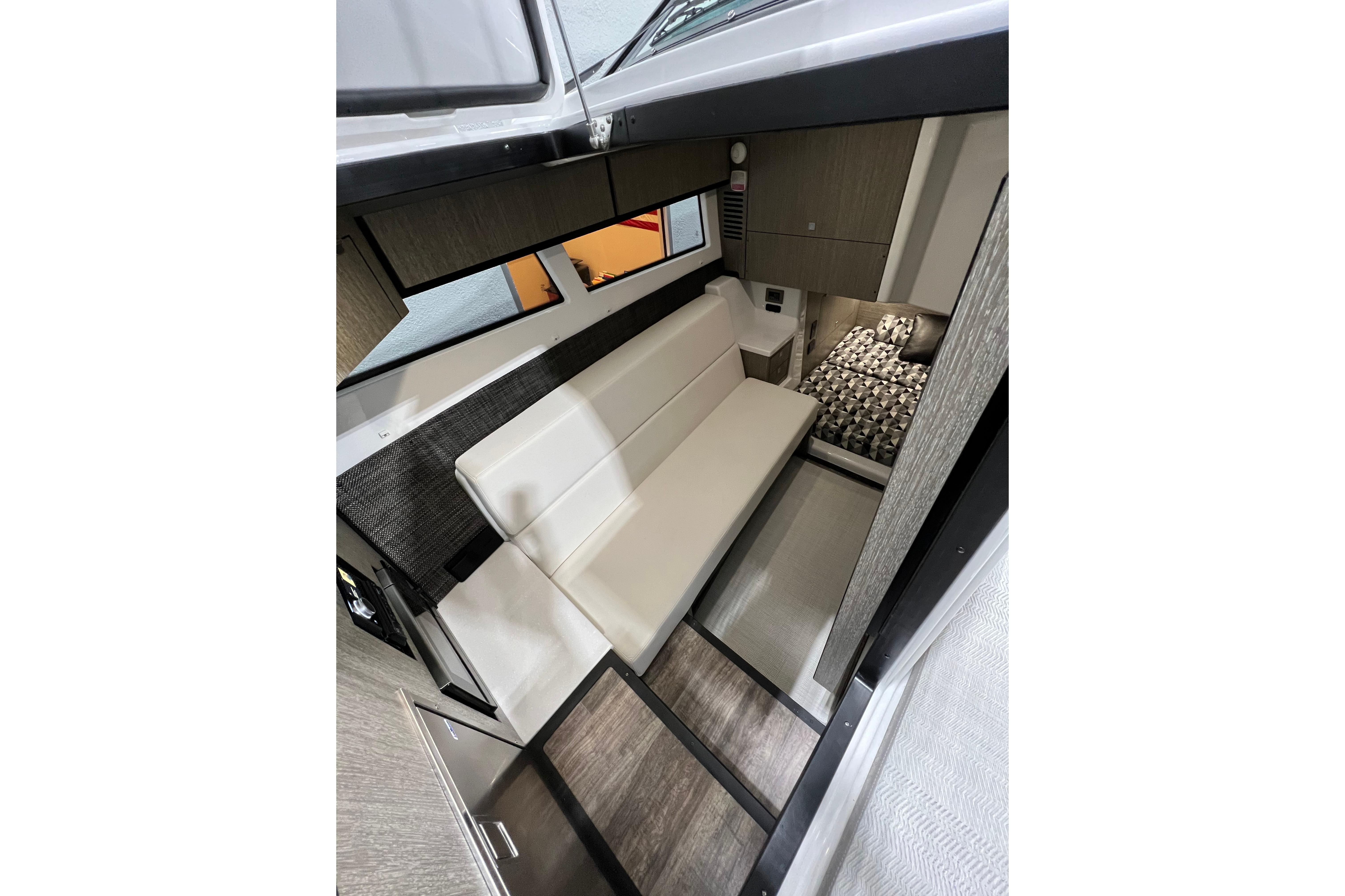 Interior of 2023 Monterey 378SS Super Sport boat, featuring modern seating and stylish design.