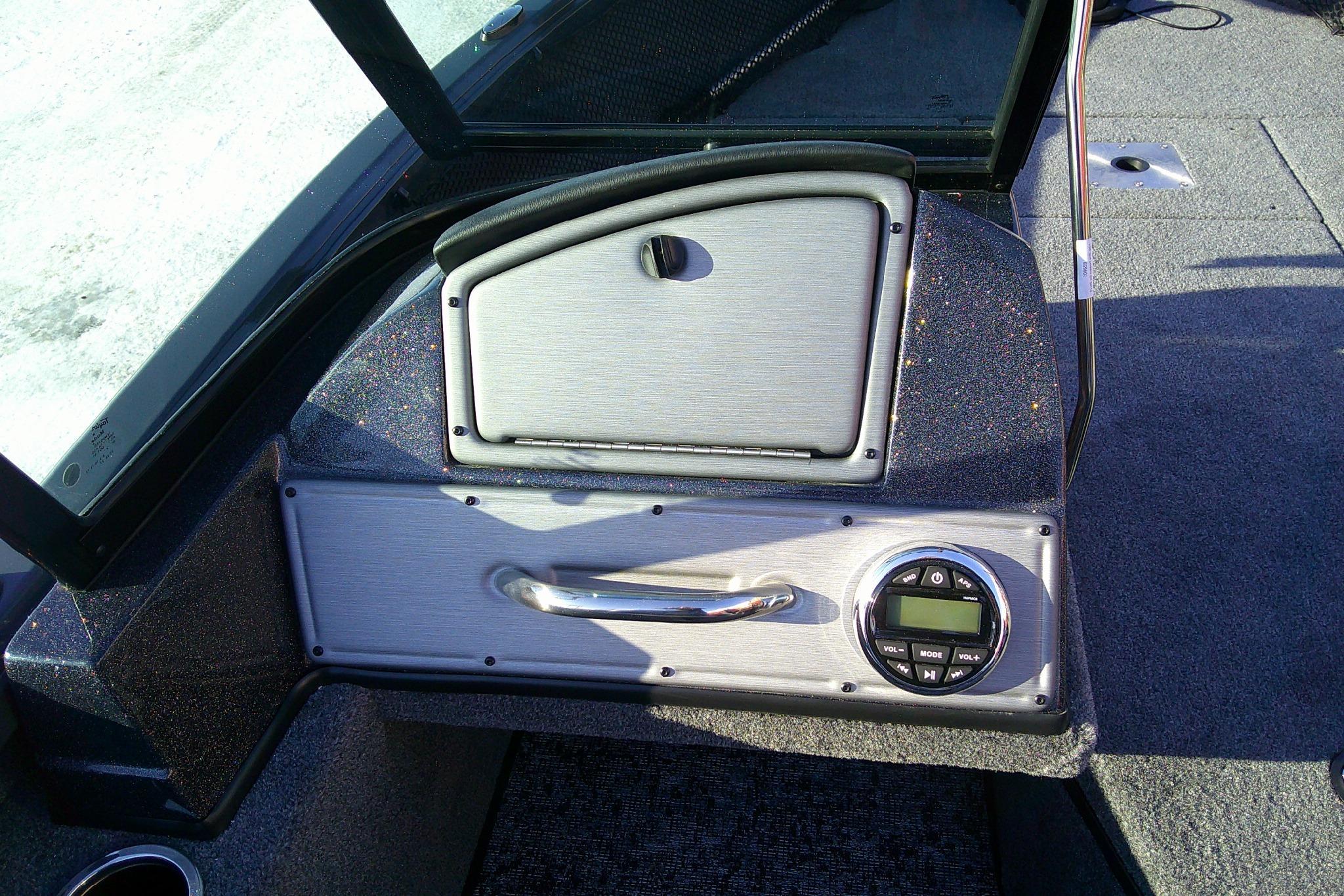 2026 Ranger VS1882SC Reata boat dashboard with control panel and storage compartment.