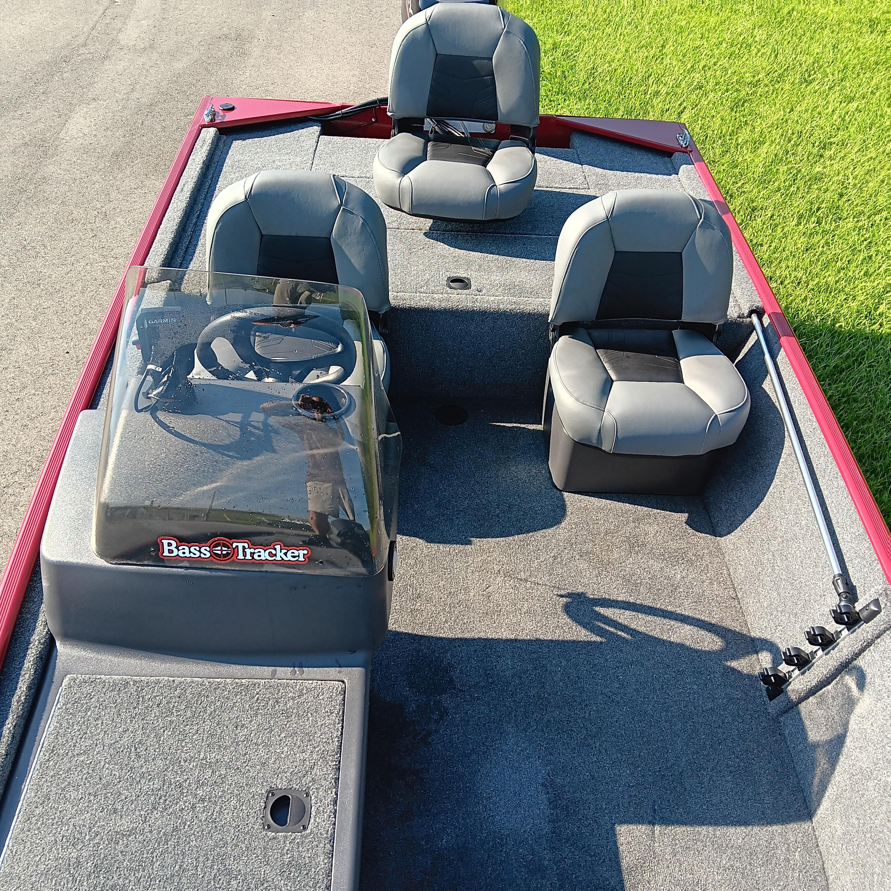 2026 Tracker Bass Tracker Classic XL boat interior with seating and steering console.
