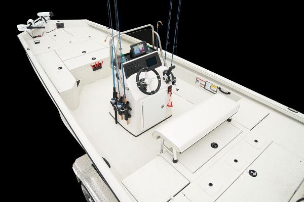 Manufacturer Provided Image: Manufacturer Provided Image: 2025 Ranger RB210 boat interior with fishing rods and console, showcasing spacious design.