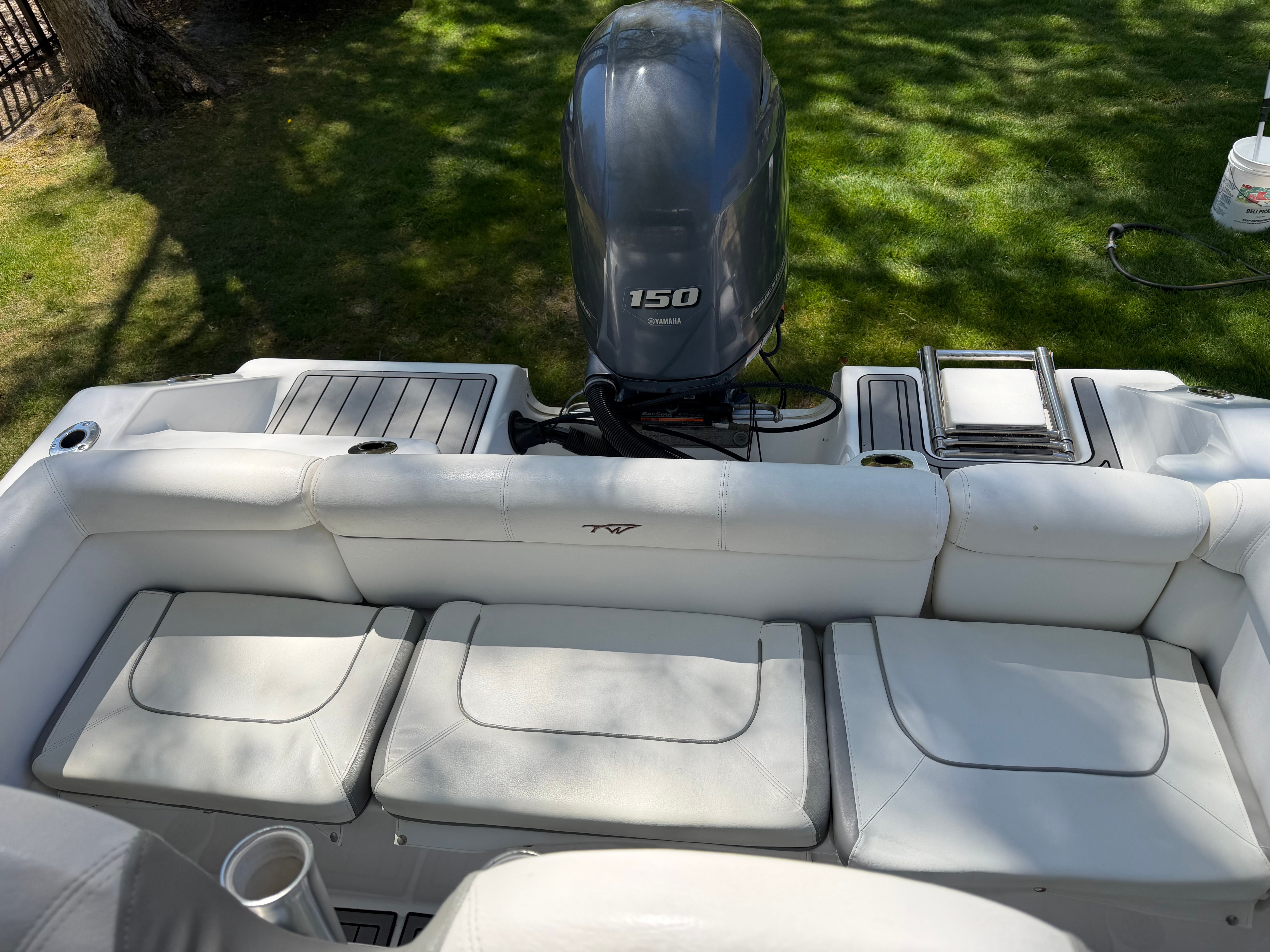 Rear view of a 2016 Tidewater 210 LXF boat with Yamaha 150 engine.