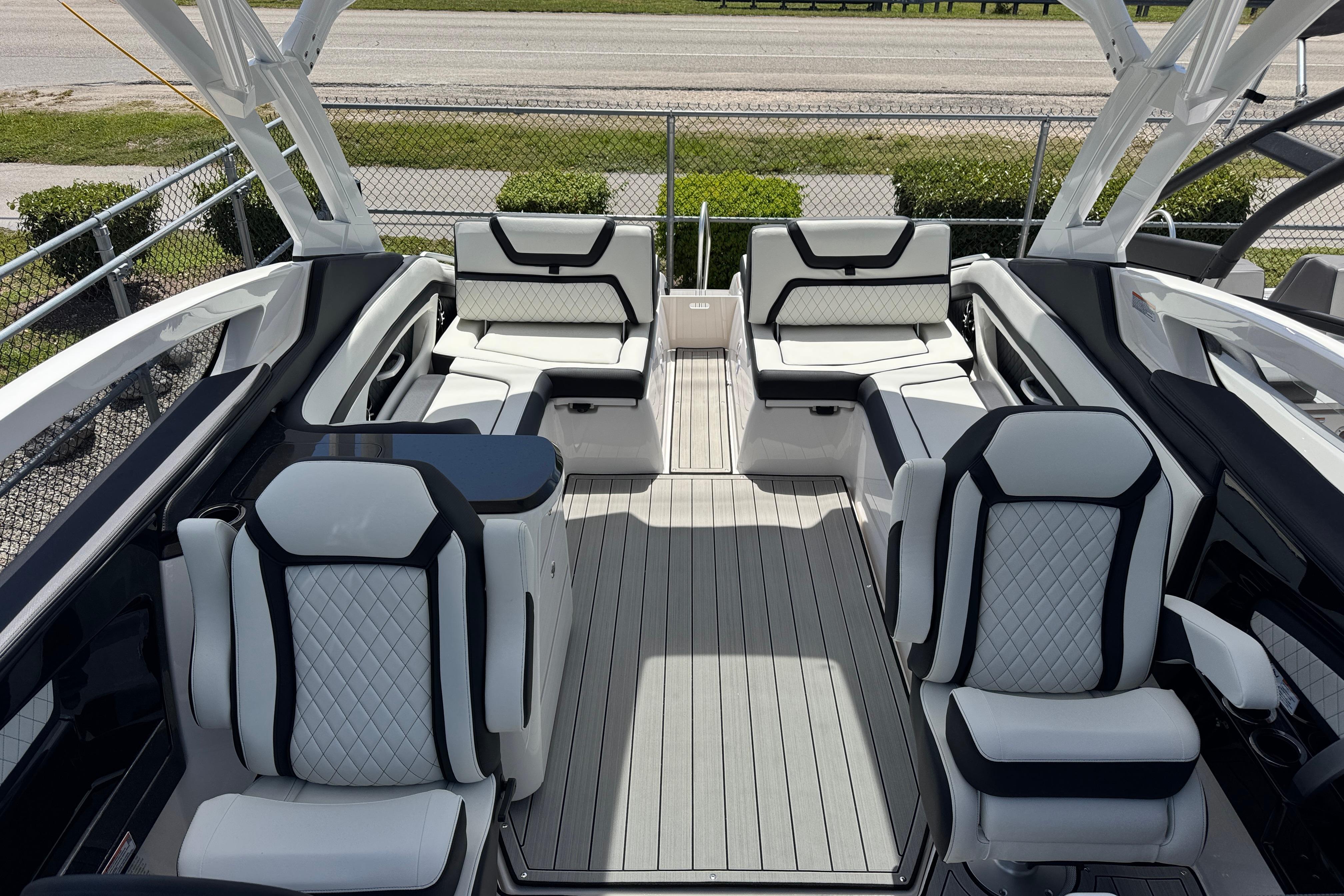 Luxurious interior of 2026 Yamaha Boats 275SD with elegant seating and modern design.