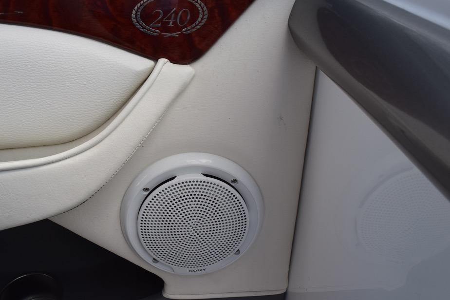 Interior of 2006 Cobalt 240 boat featuring Sony speaker and elegant design.