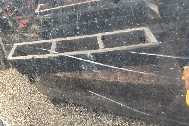 Scratched surface of a 2021 Chaparral 21 SSi boat, showing wear and tear.