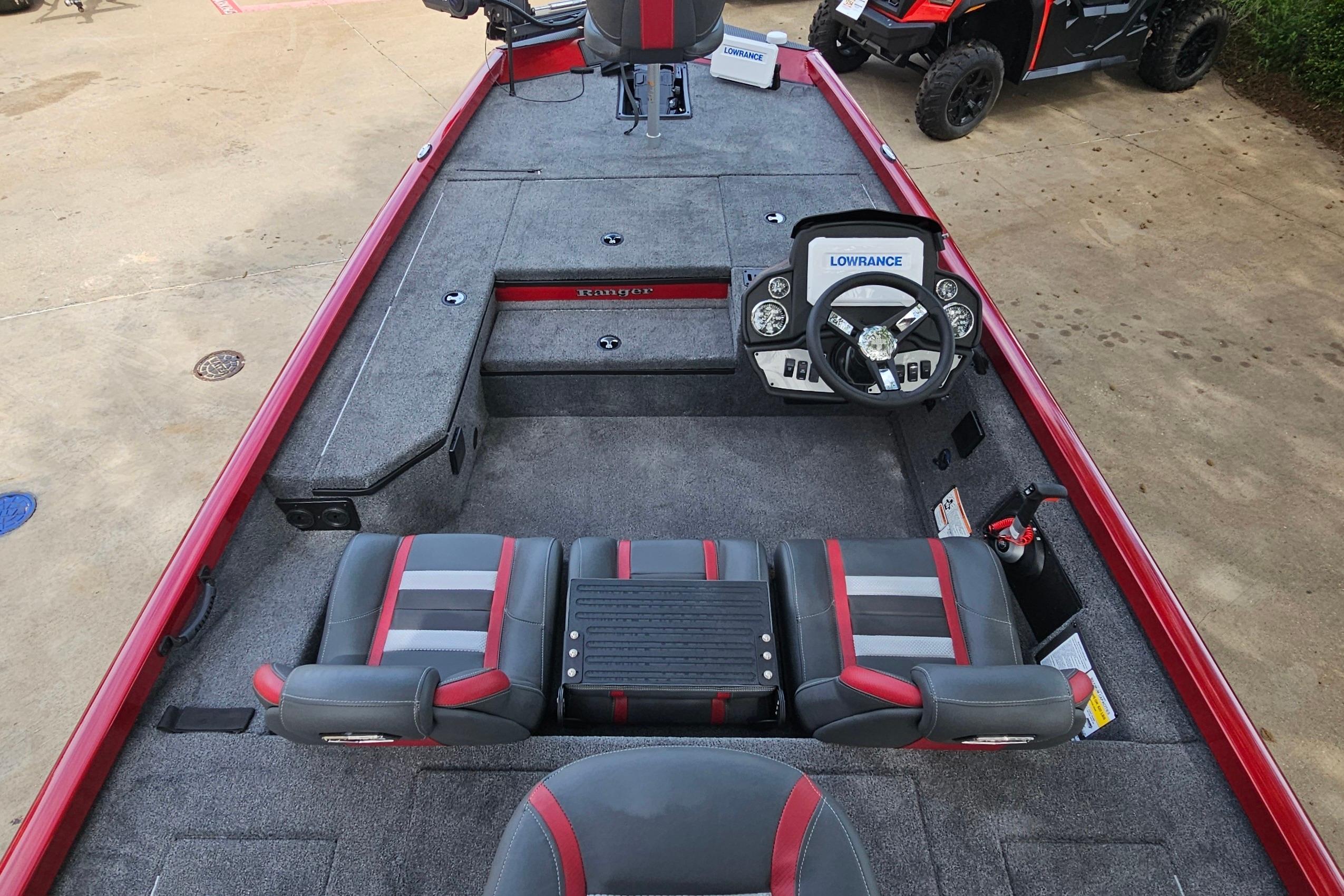 2026 Ranger RT178 boat interior with steering wheel and seating, featuring Lowrance electronics.