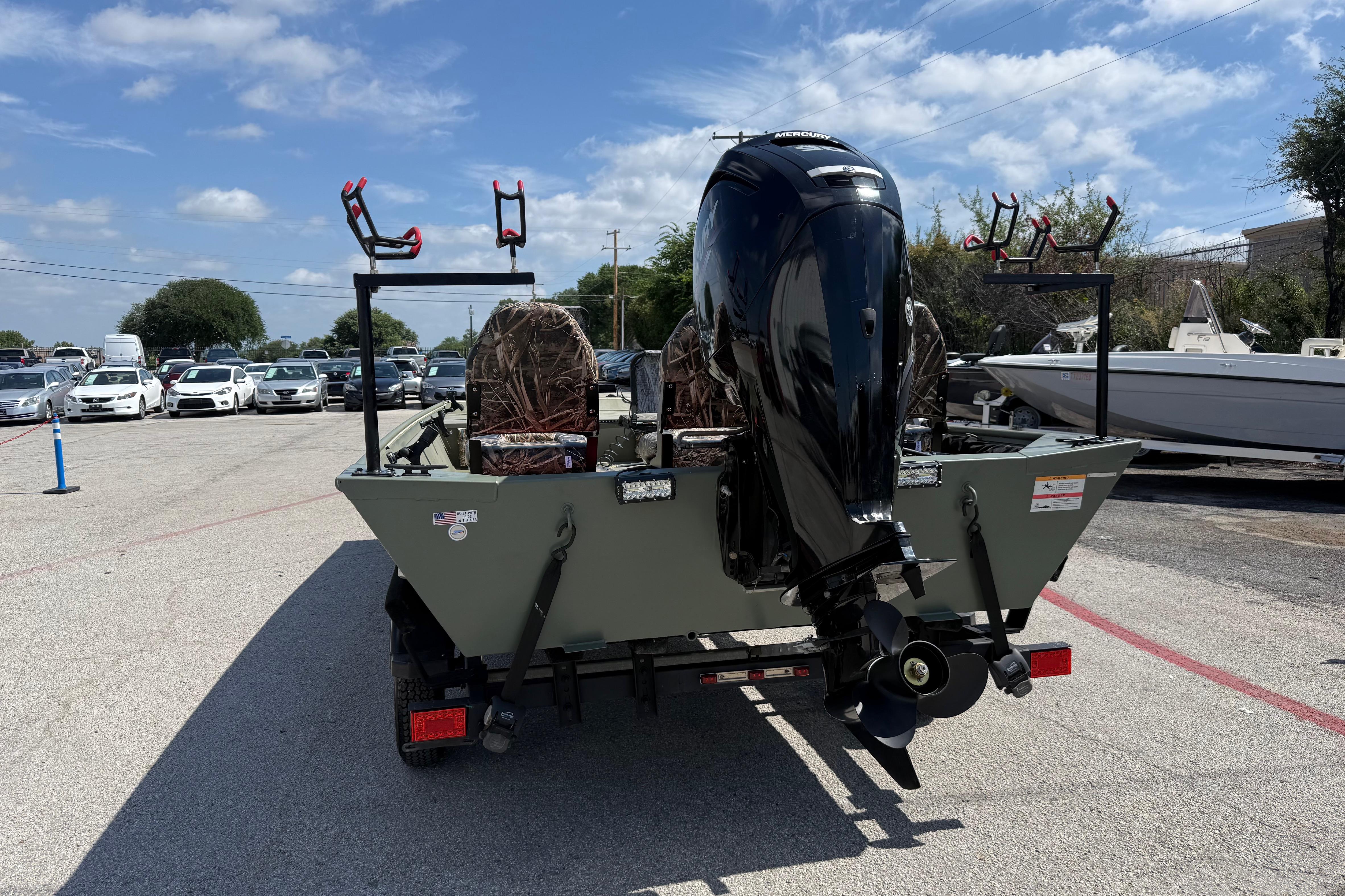 The image shows a 2020 Lowe Roughneck 2070 Big River boat on a trailer.