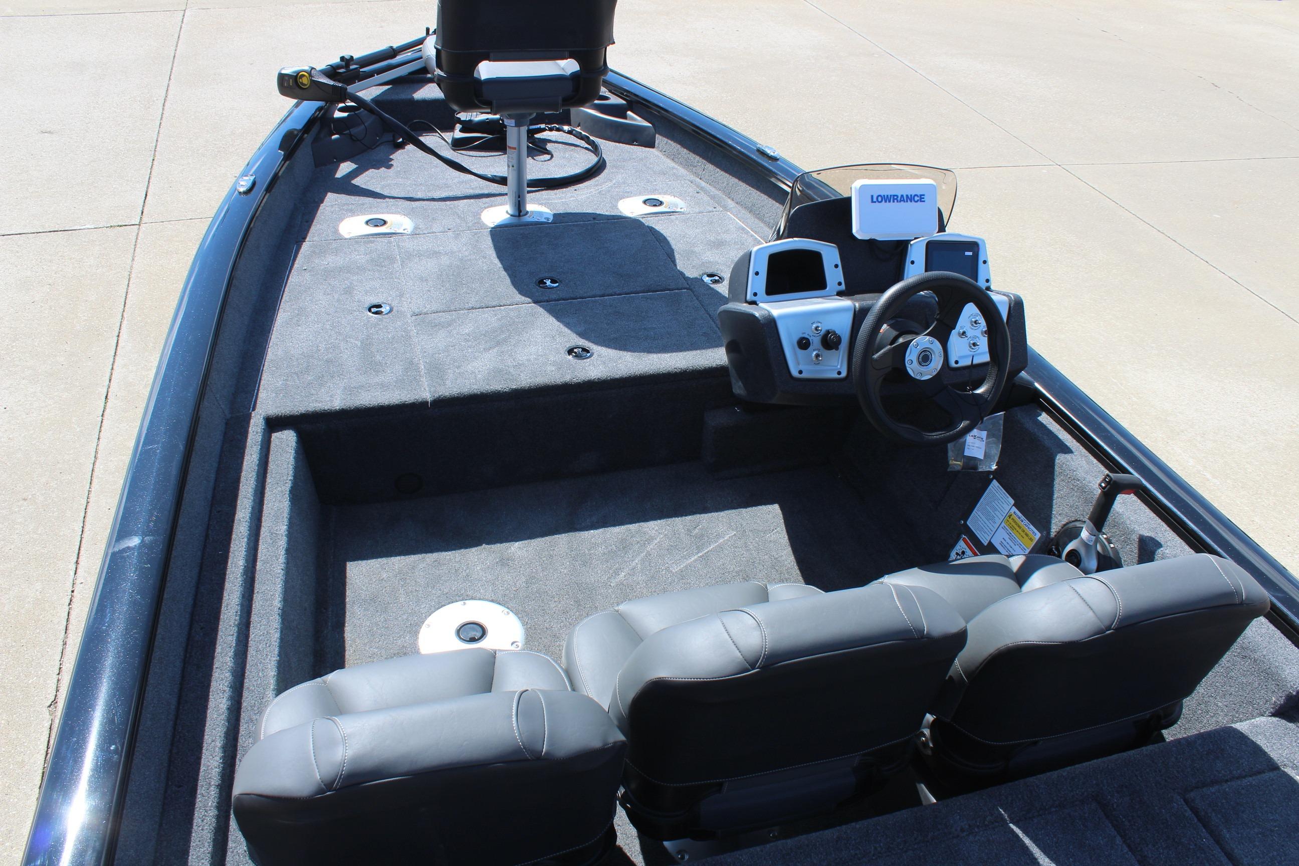 2026 Tracker Pro Team 175 Crappie Edition boat interior with steering console and seating.