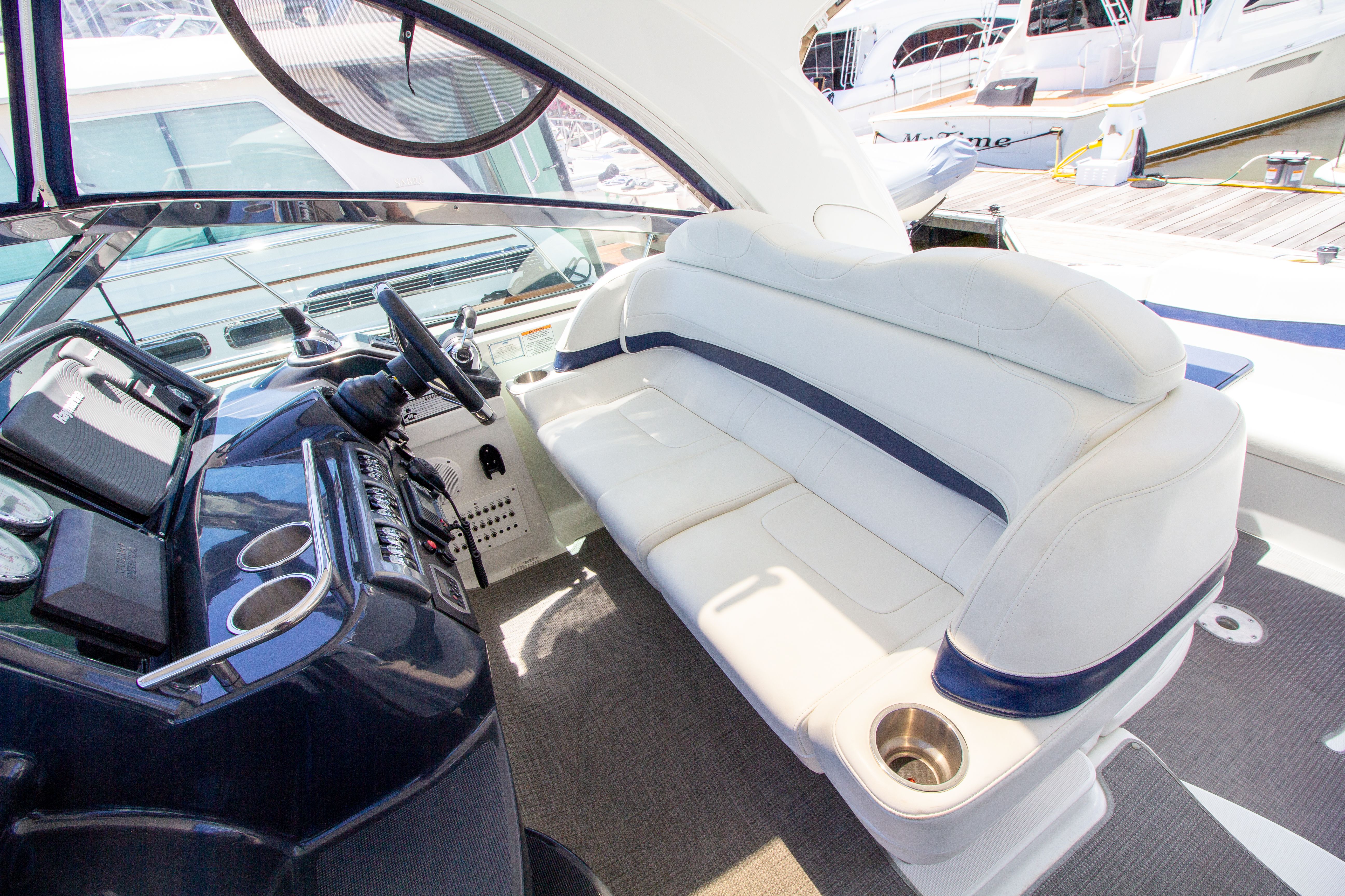 Interior of a 2016 Formula 40 Performance Cruiser with white seating area.