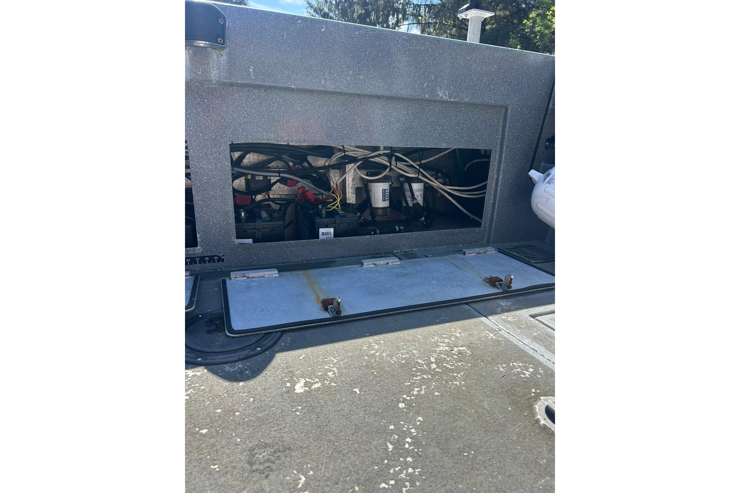 2016 North River 29 Offshore boat engine compartment with visible wiring and components.