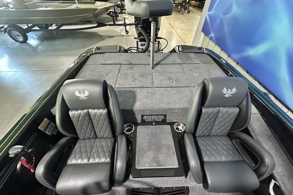 2026 Phoenix 819 ZXL boat interior with dual seats and carpeted deck.