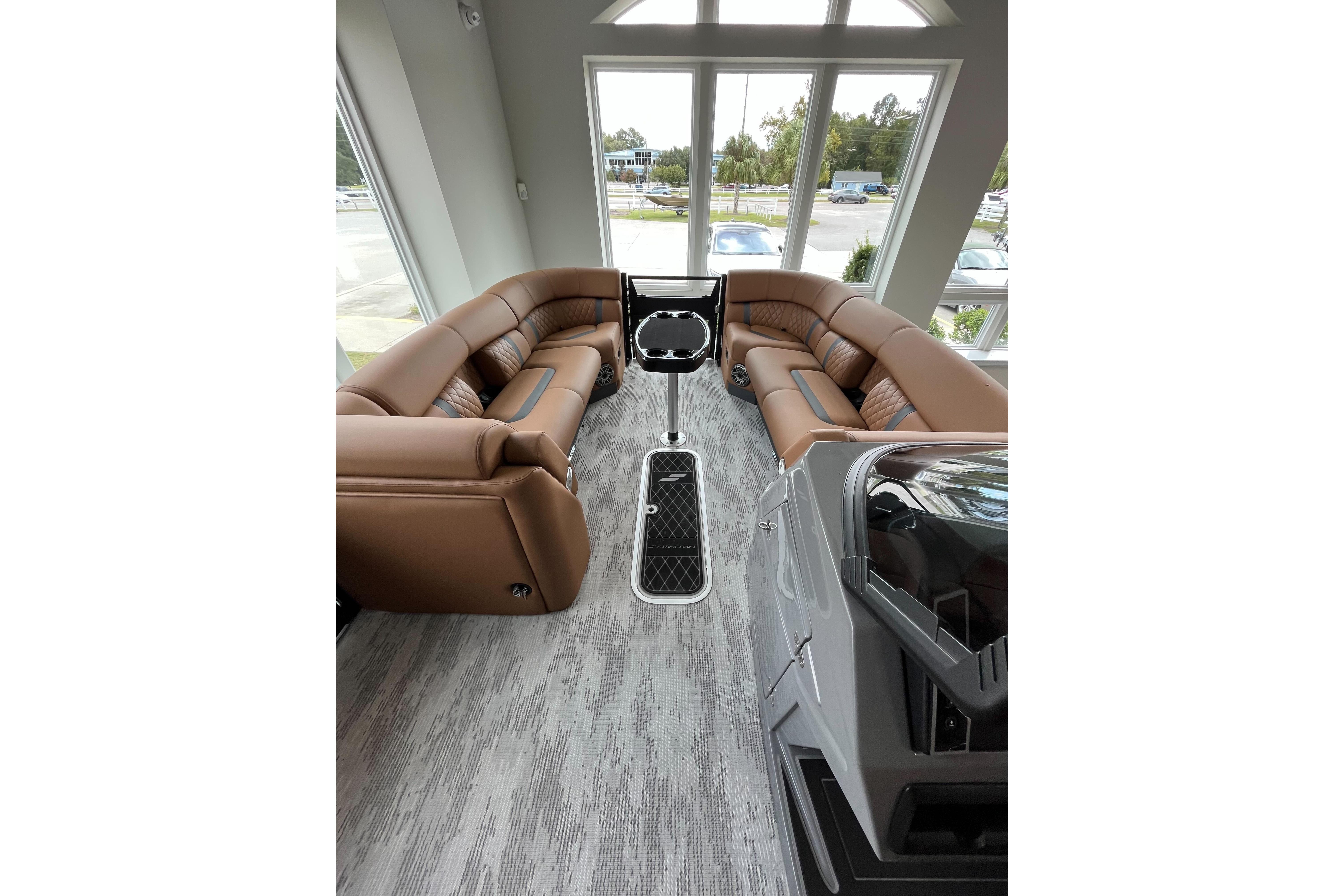 Luxurious interior of 2026 Starcraft RX 25 DL DC boat with plush seating and modern design.
