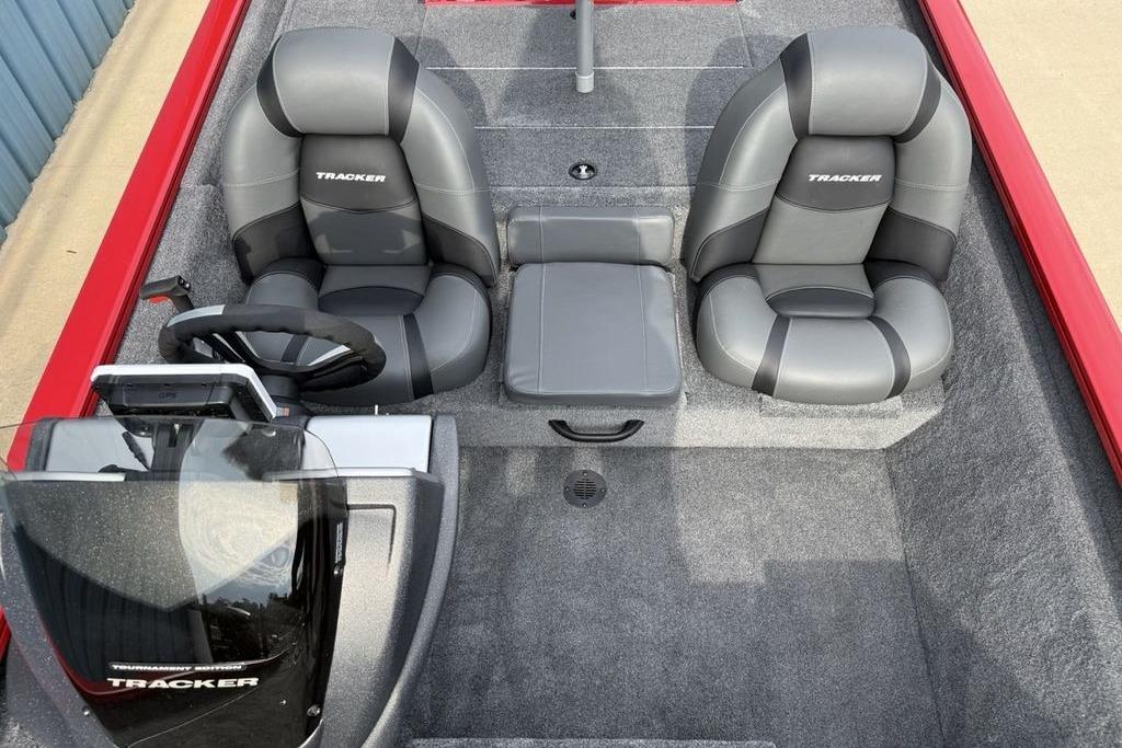 2026 Tracker Pro Team 175 boat interior with dual gray seats and steering console.