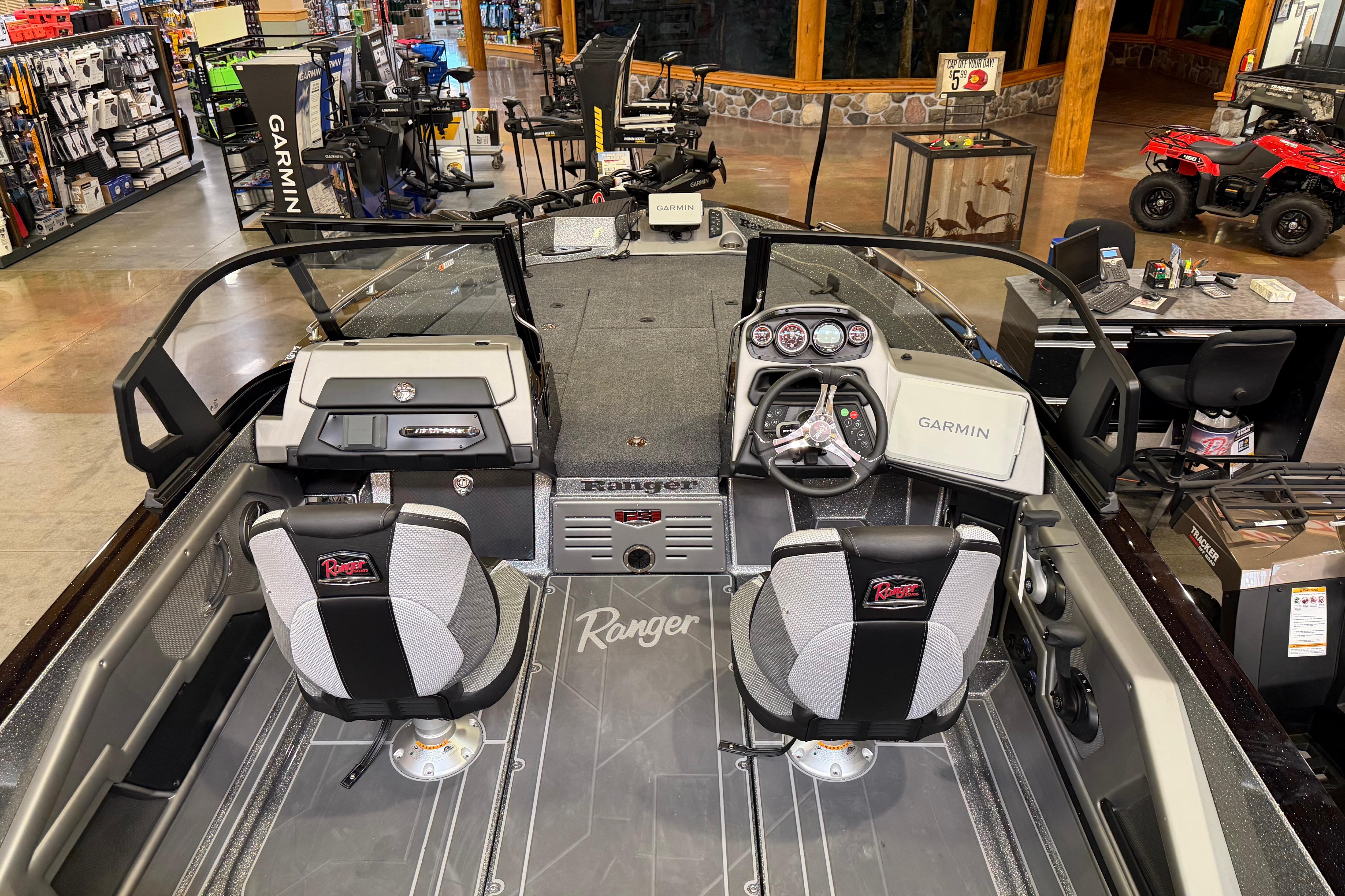 2026 Ranger 621FS Cup-Equipped boat interior with Garmin electronics in a showroom.