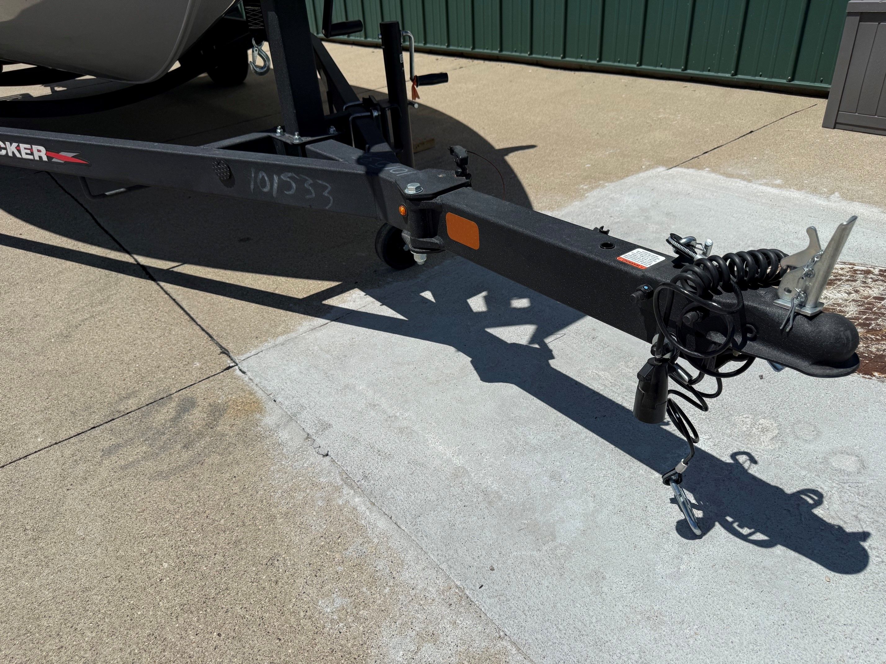 Trailer of a 2024 Tracker Pro Guide V175 boat.