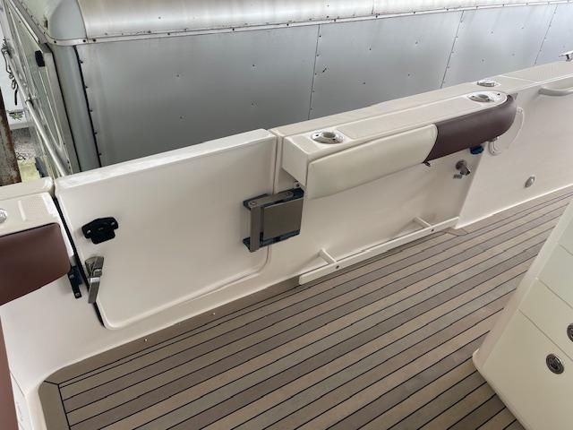 2014 Everglades 325 Center Console boat interior with sleek deck and seating.