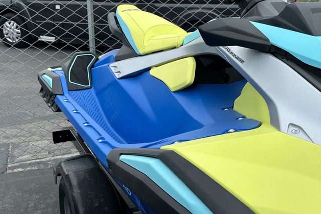 Yamaha WaveRunner JETBLASTER PRO 3 in vibrant blue and yellow on a trailer.
