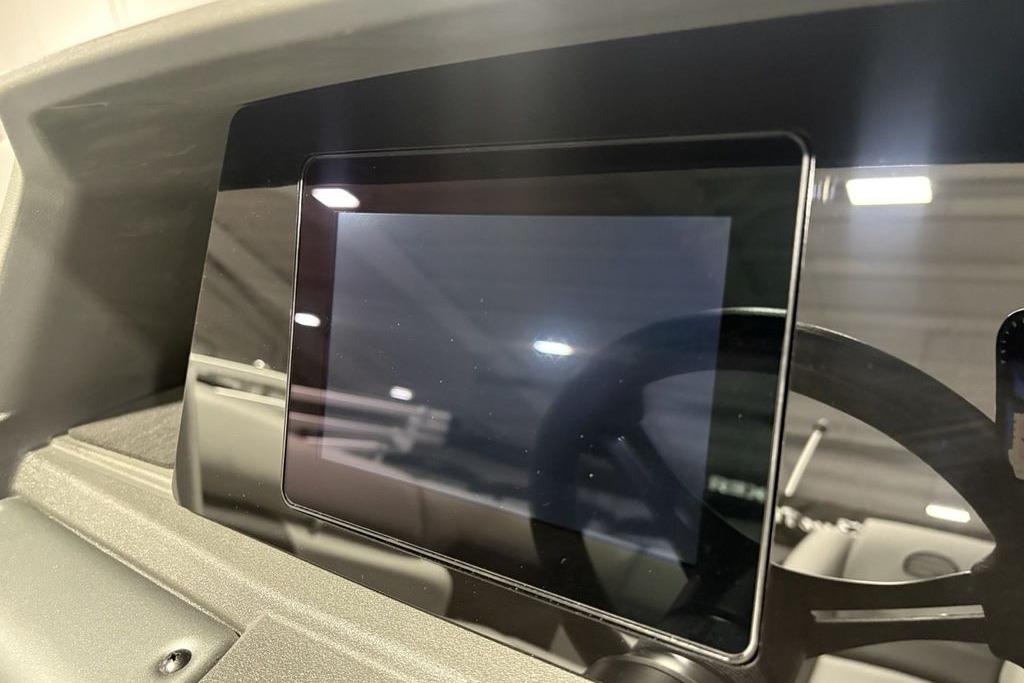 2026 Sun Tracker PARTY BARGE® 20 DLX dashboard with touchscreen display.
