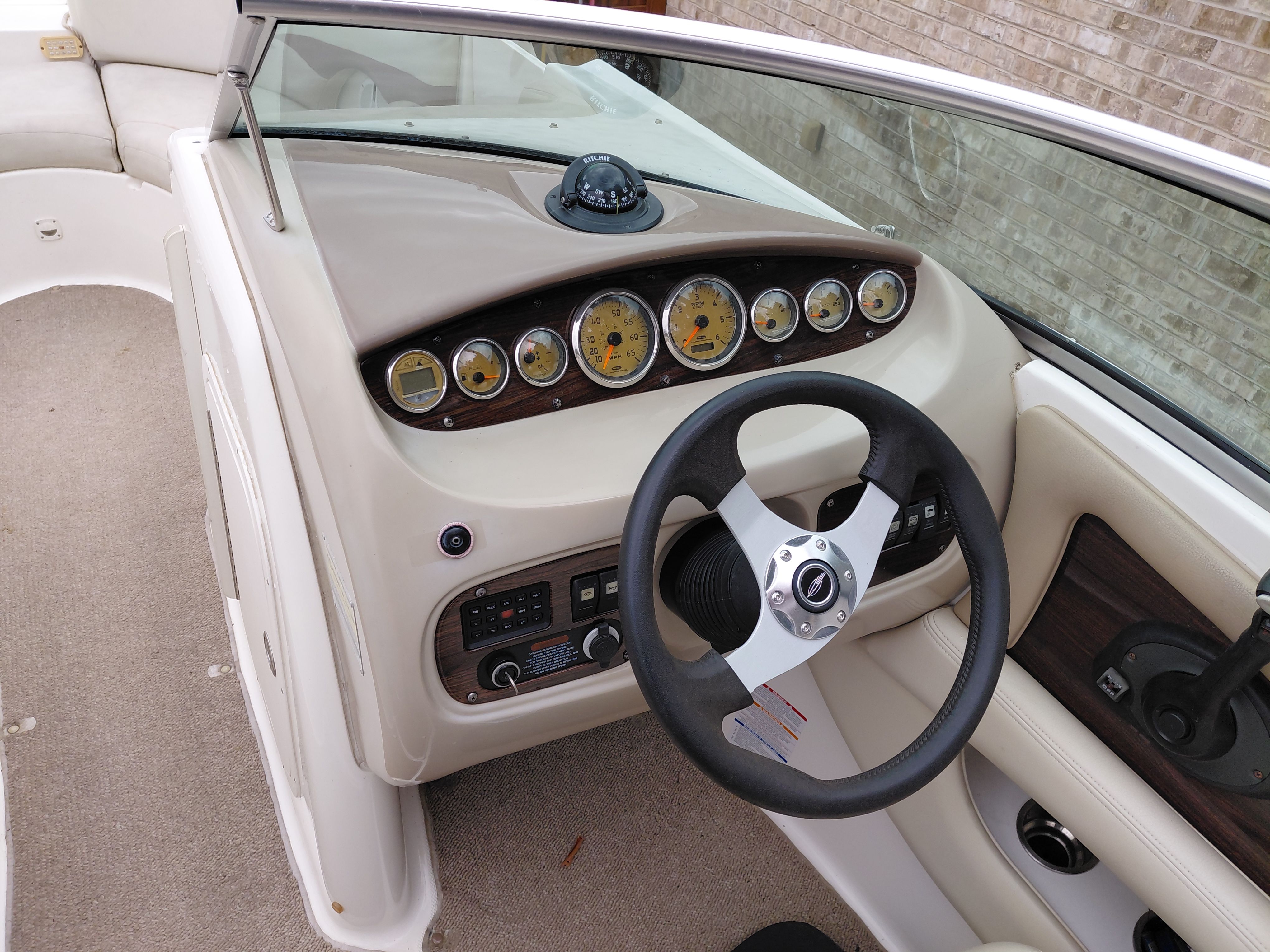 Interior view of 2005 Chaparral Sunestra 254 boat cockpit.