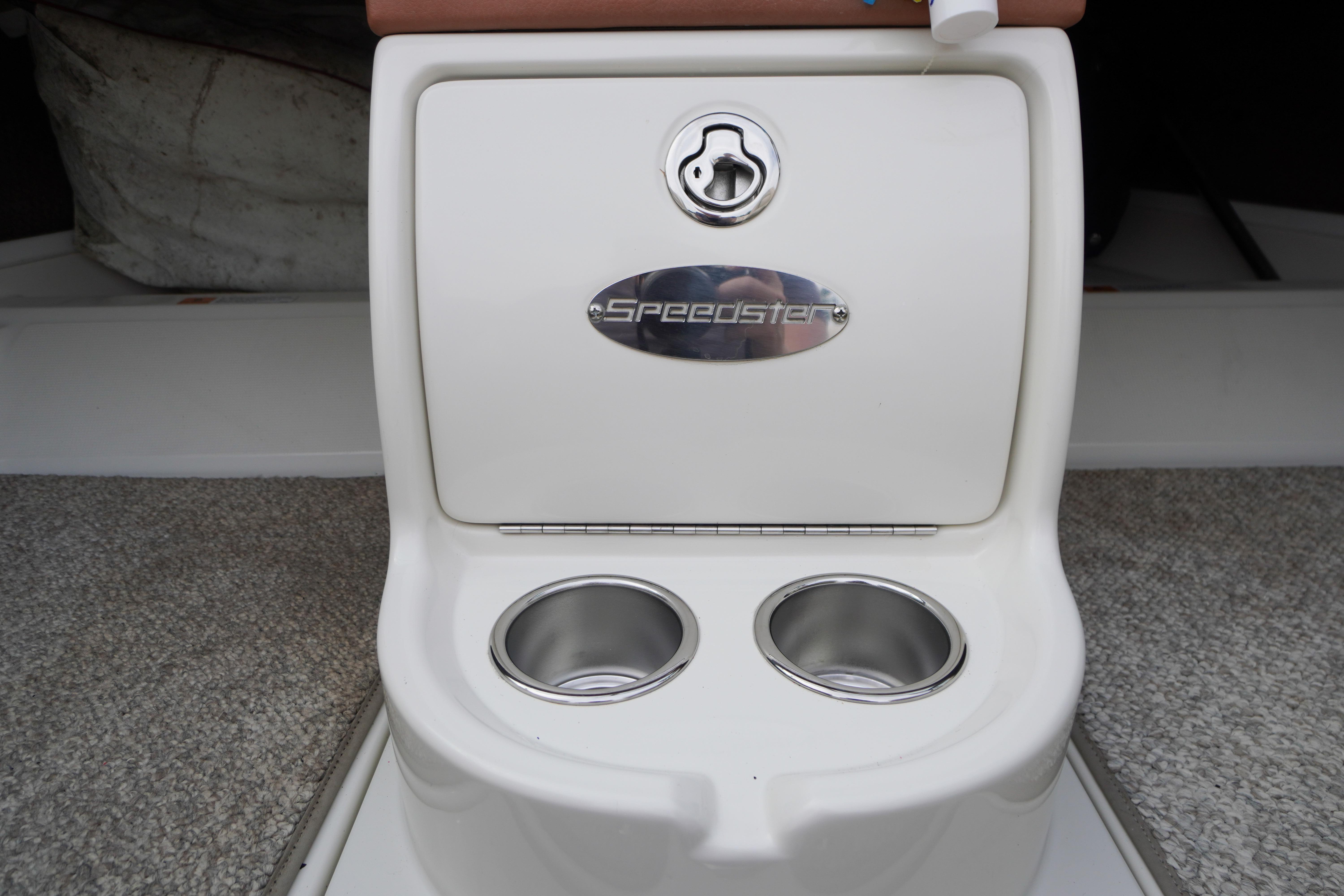 2005 Chris Craft Speedster Heritage boat console with cup holders and Speedster emblem.