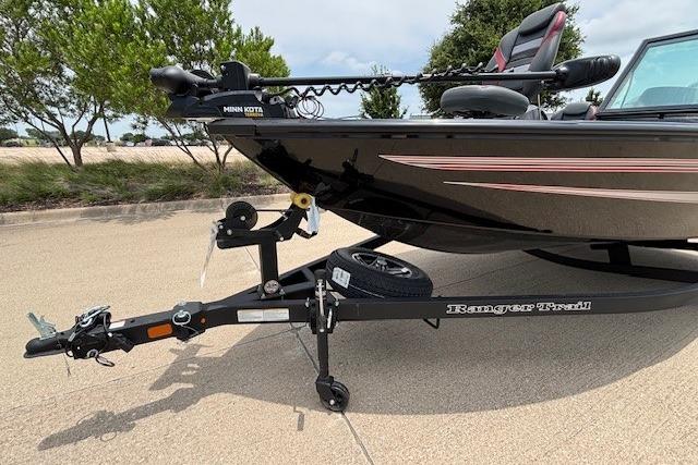 2026 Ranger VS1782SC Angler boat on trailer, parked outdoors.