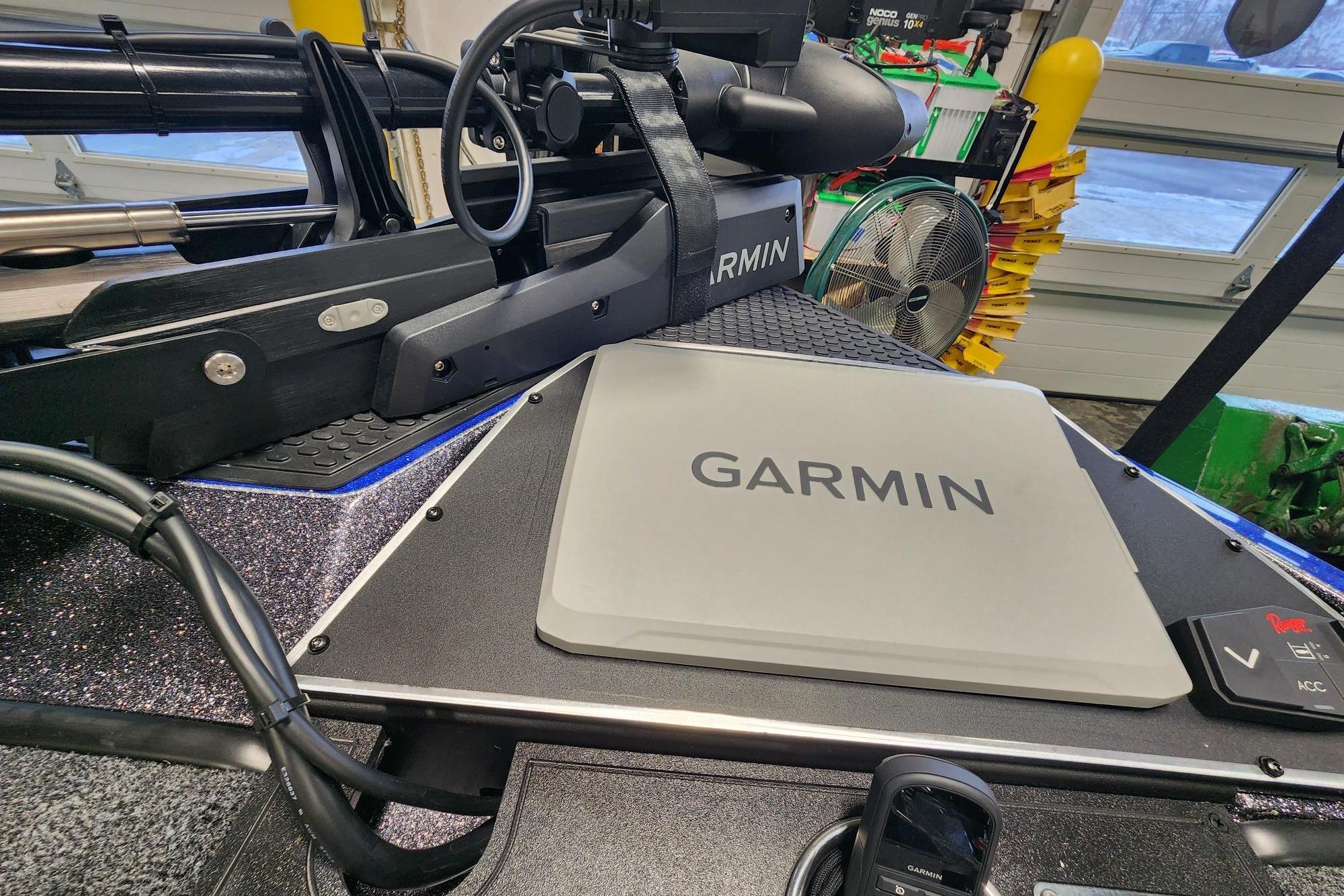 2025 Ranger Z521R boat with Garmin electronics in a garage setting.