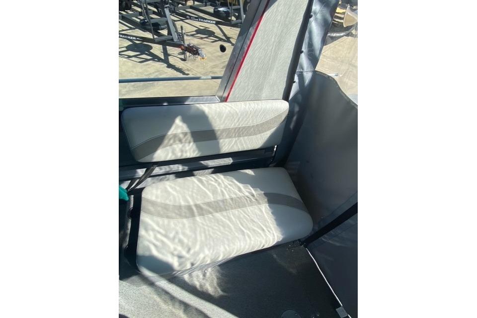 2023 Spartan 200 Astoria interior seat with sunlight reflections.