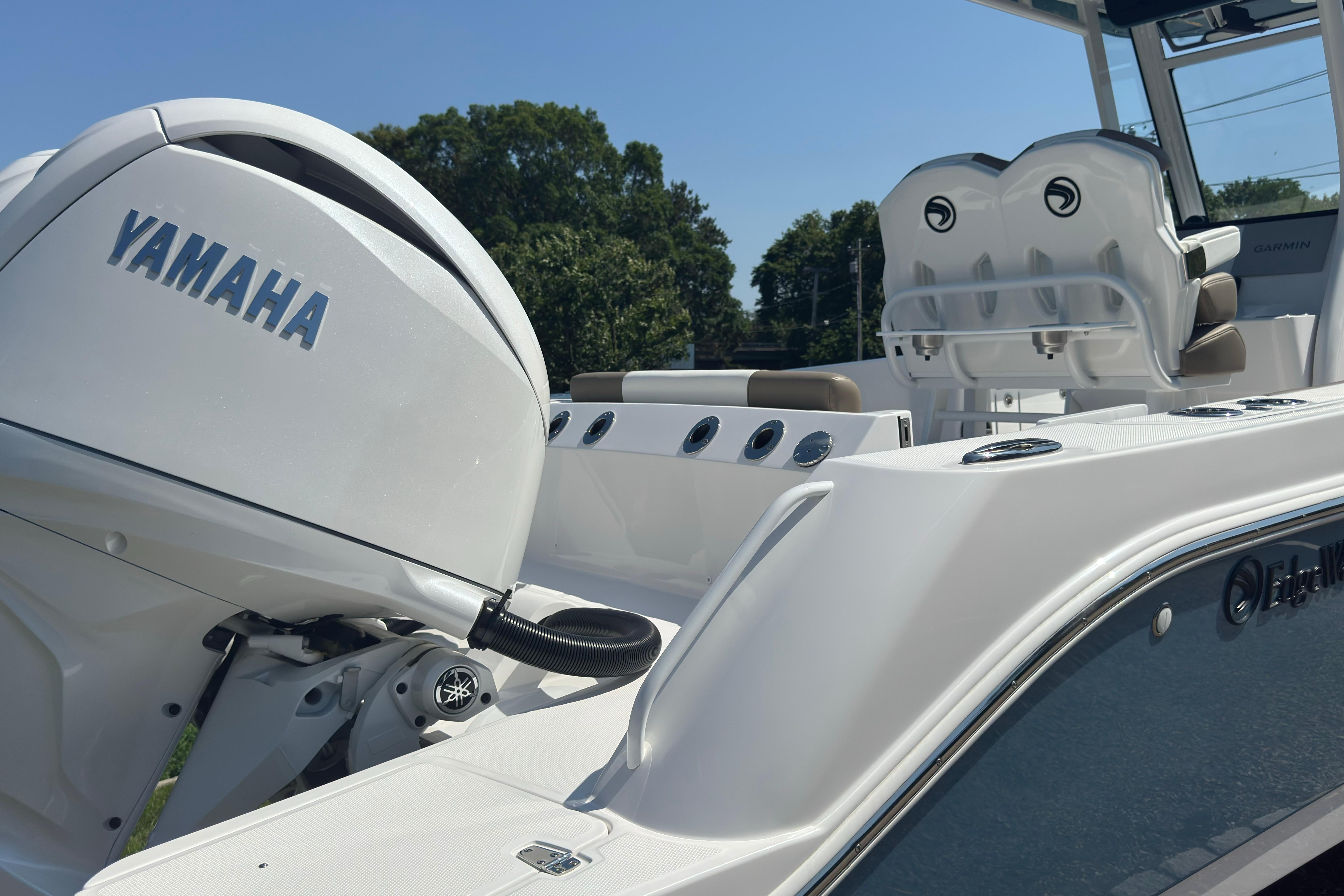 2026 Edgewater 250CC boat with Yamaha engine, featuring sleek design and modern seating.