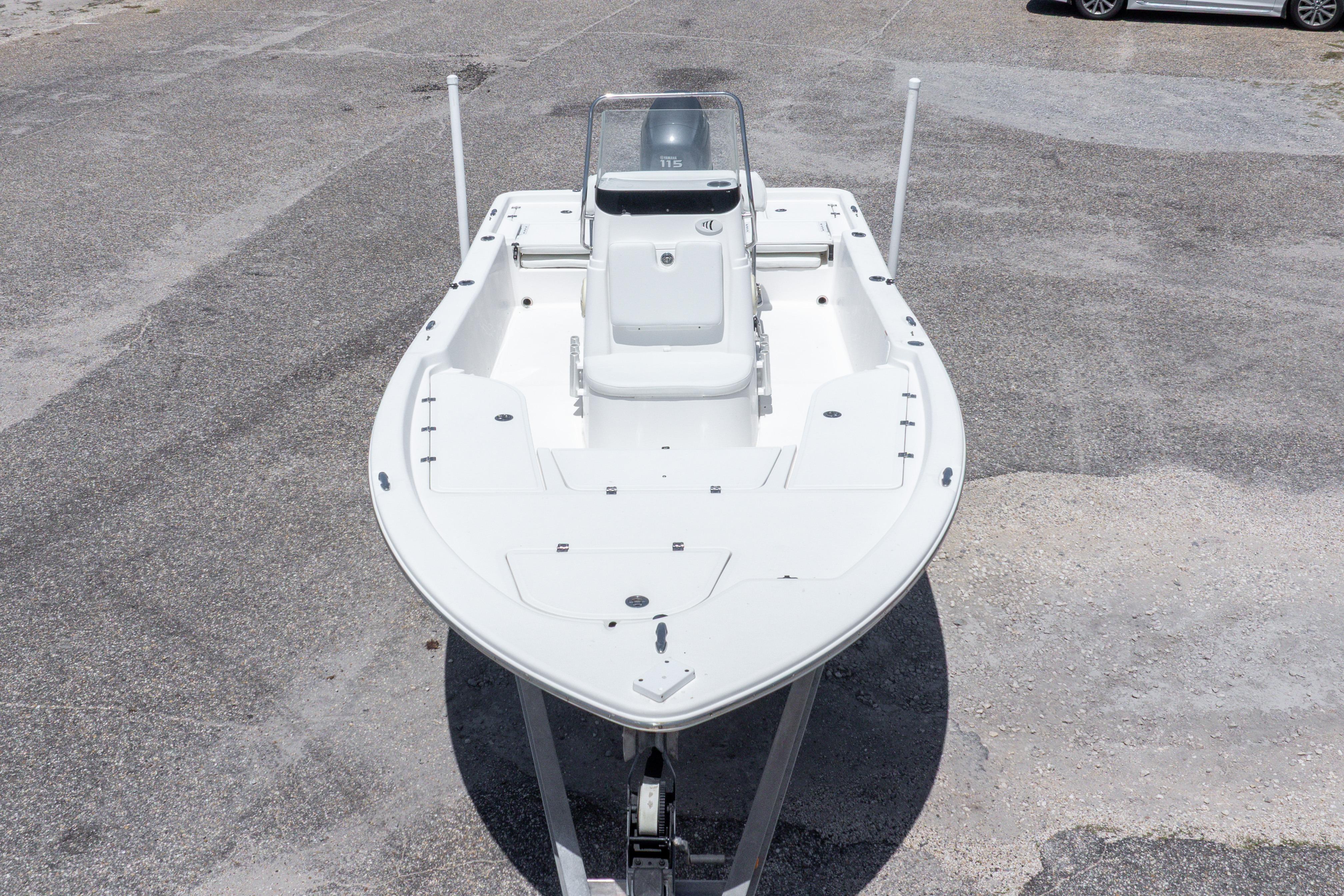 2011 Sea Fox 200XT boat on a trailer, viewed from above on a concrete surface.