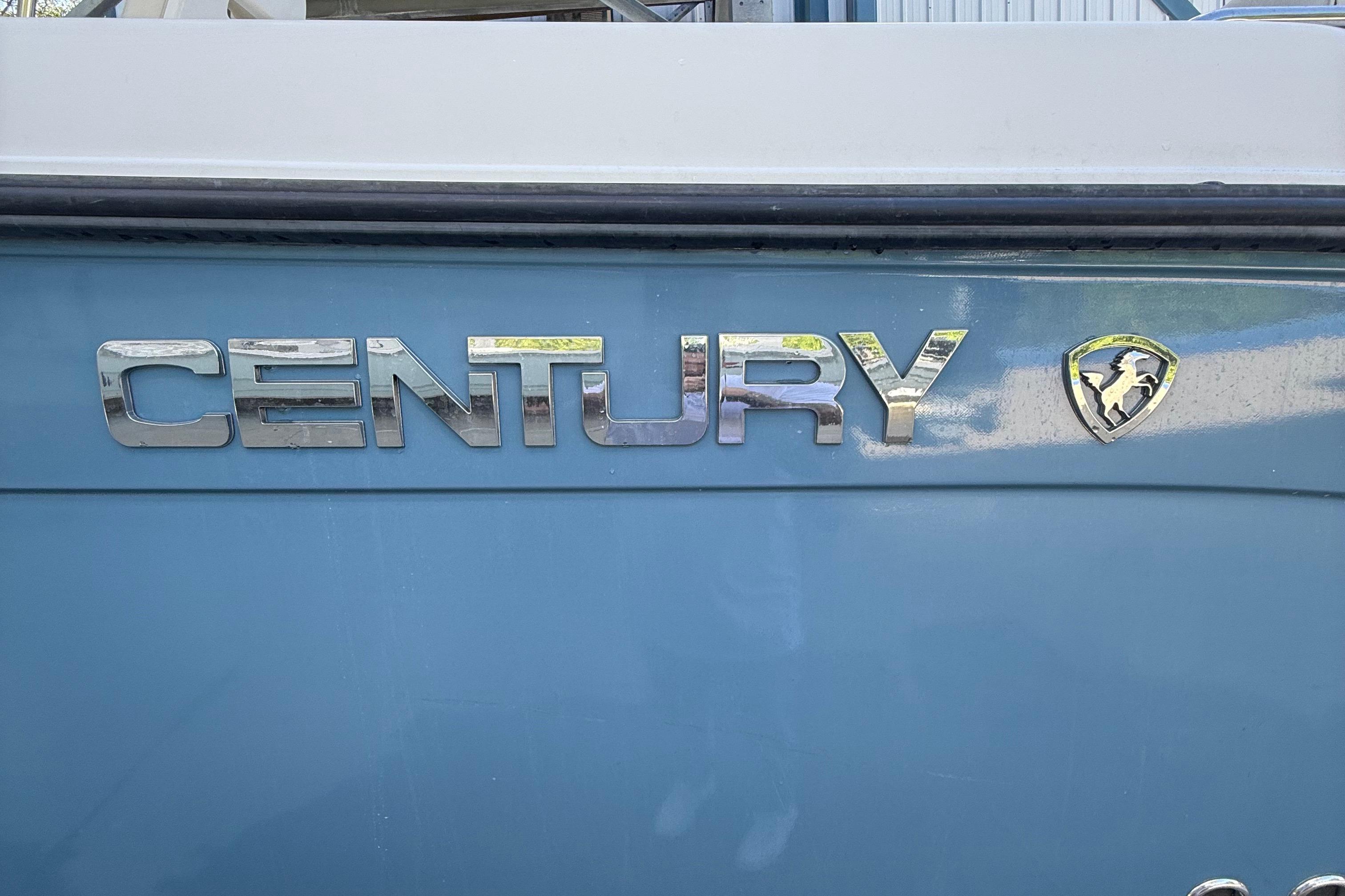 Century 2901 Center Console 2008 boat logo on blue background.