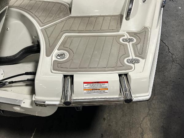 2023 Crownline Eclipse E235 XS boat swim platform with ladder.