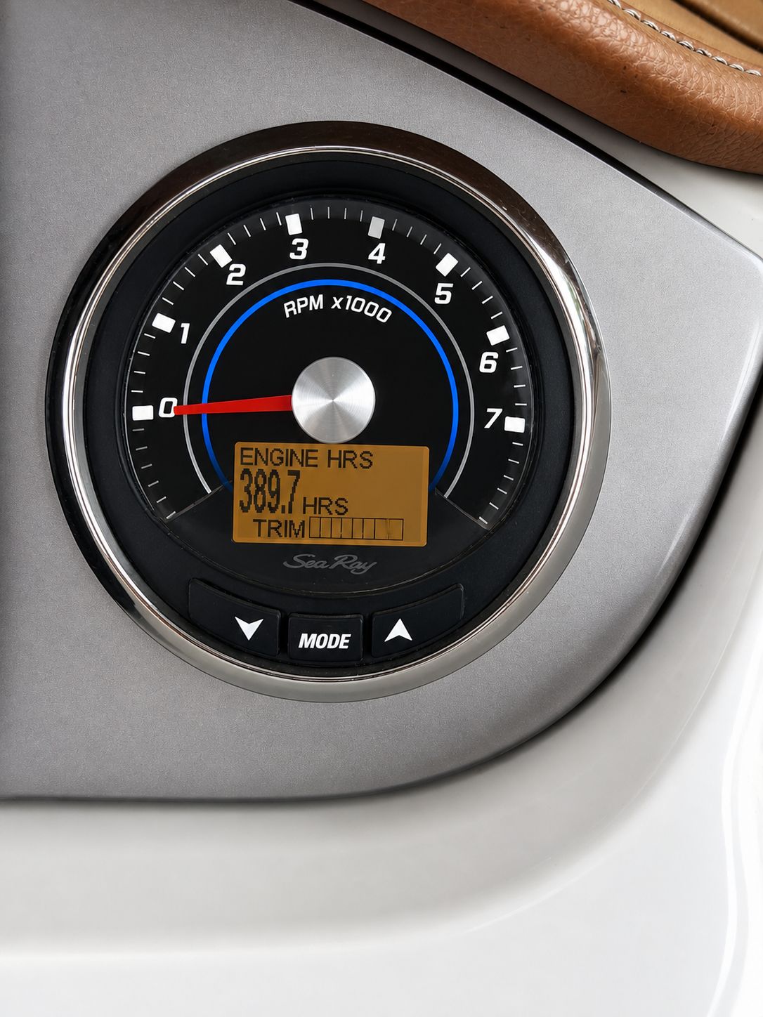 Sea Ray 290 Sundeck 2016 tachometer showing 389.7 engine hours.