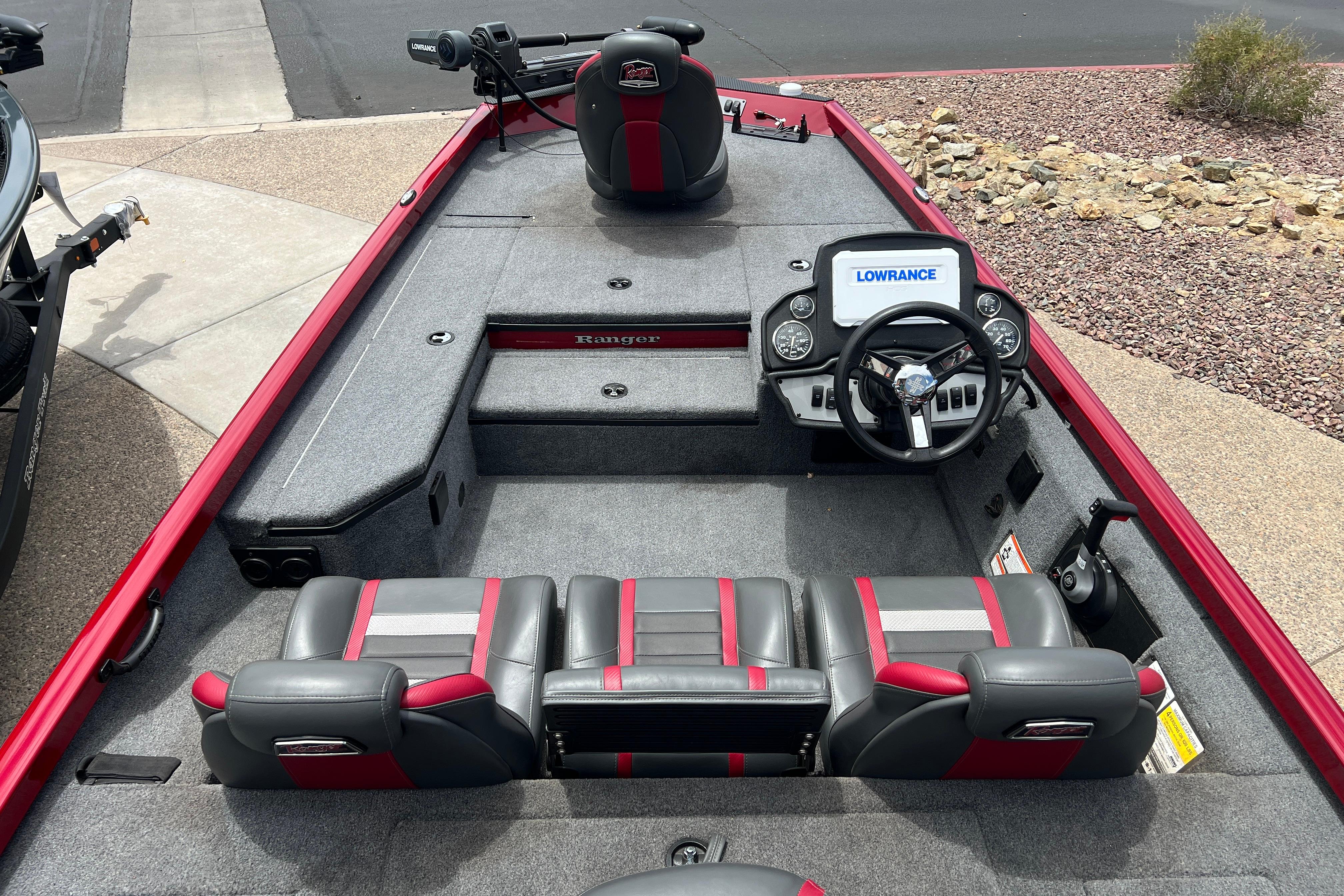 2026 Ranger RT178 boat interior with steering console, seating, and Lowrance electronics.