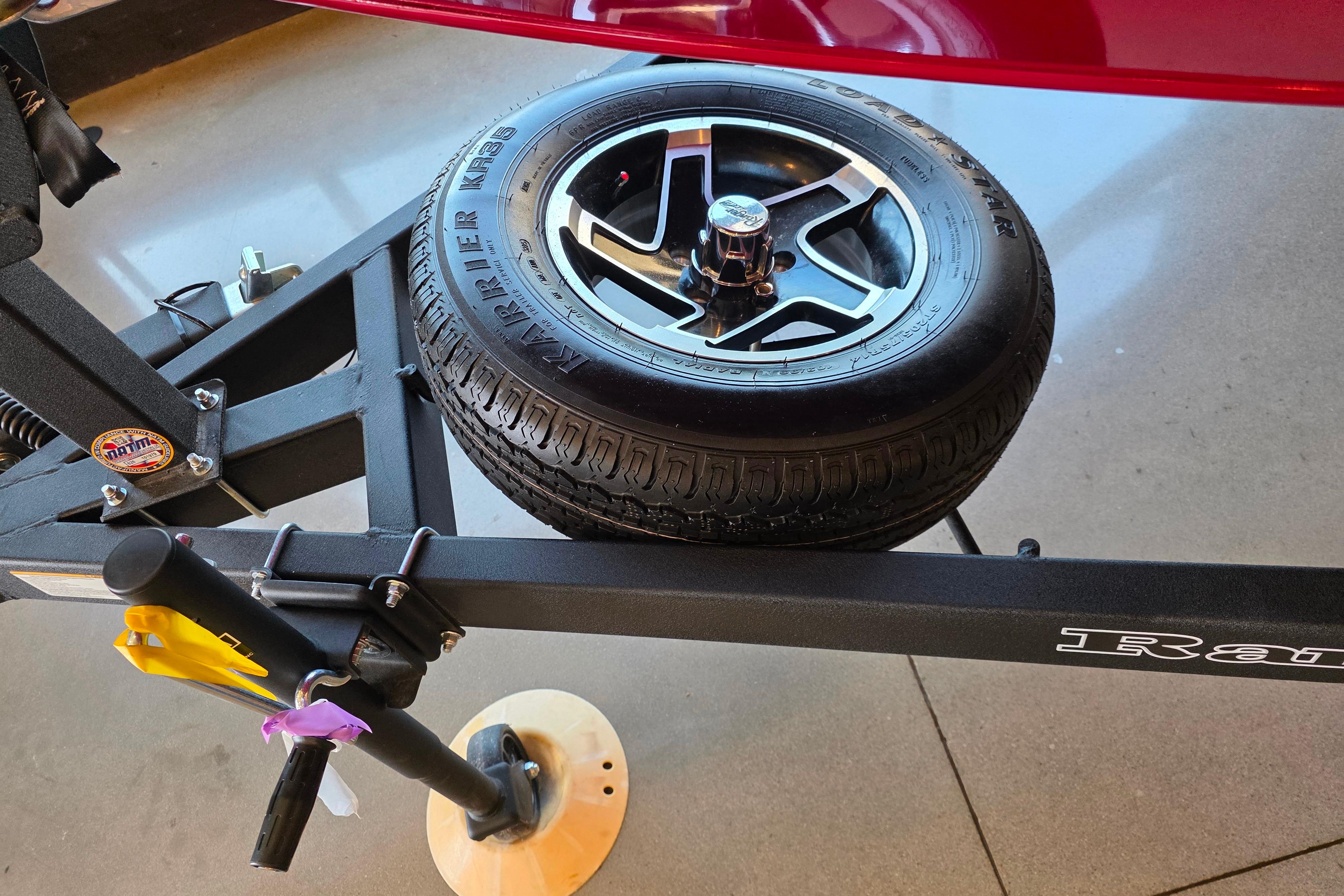 Trailer wheel of 2026 Ranger VS1782SC Reata boat, featuring a Kenda Karrier tire.