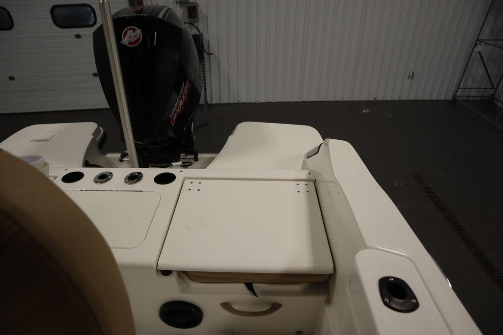 2026 Bayliner Trophy T20CC boat interior with engine and seating area.