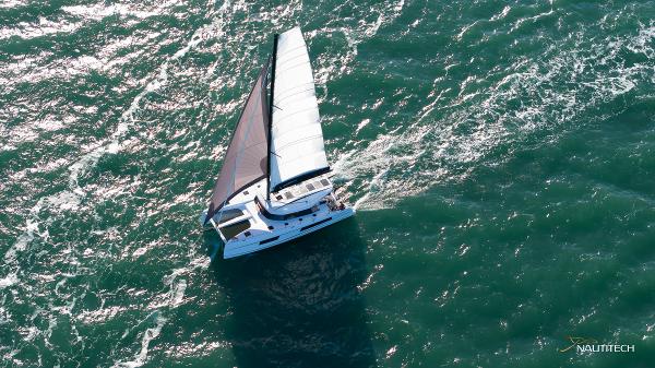 Aerial view of 2025 Nautitech 48 Open sailing on open sea.