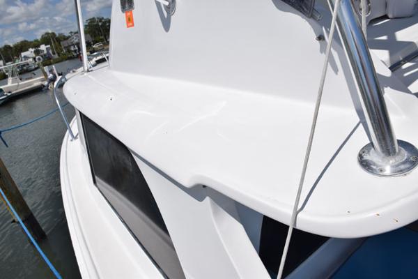 Deckhouse side windows are fiberglass