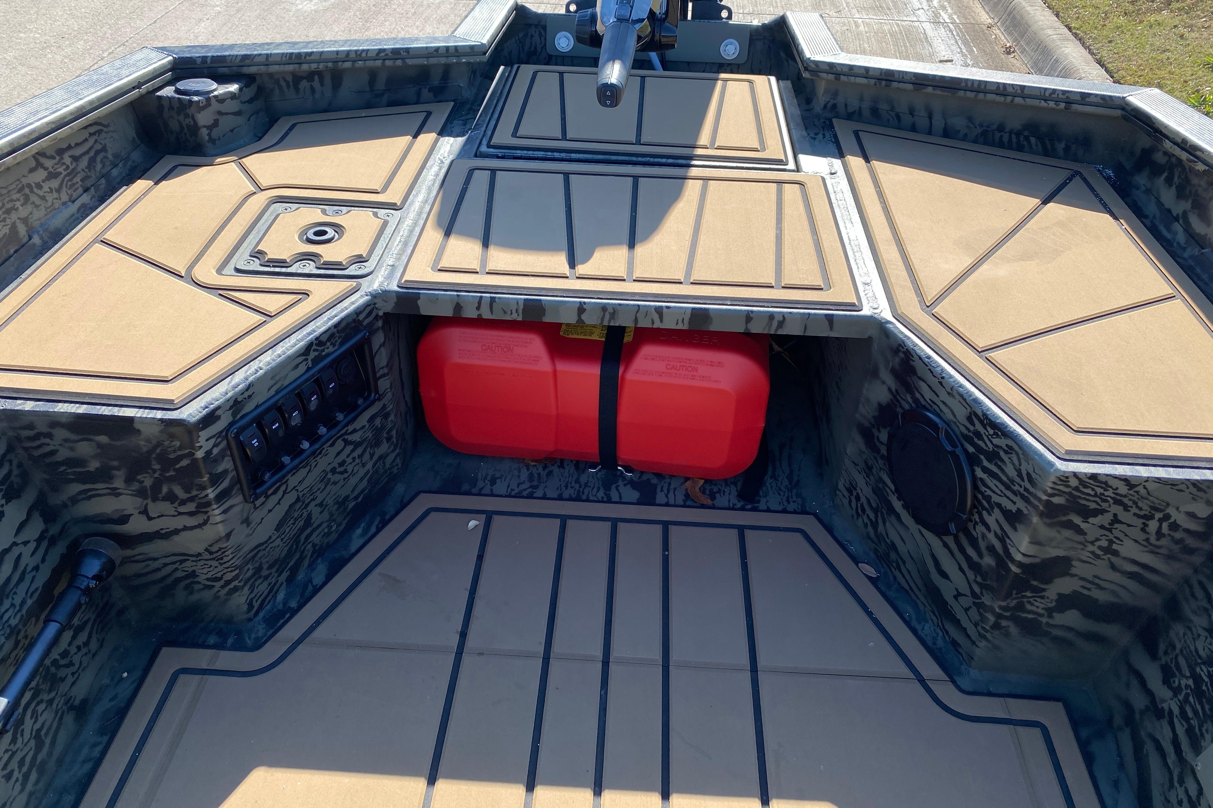 2026 Tracker Grizzly 1650 T Prairie Wings Edition boat interior with storage compartments.