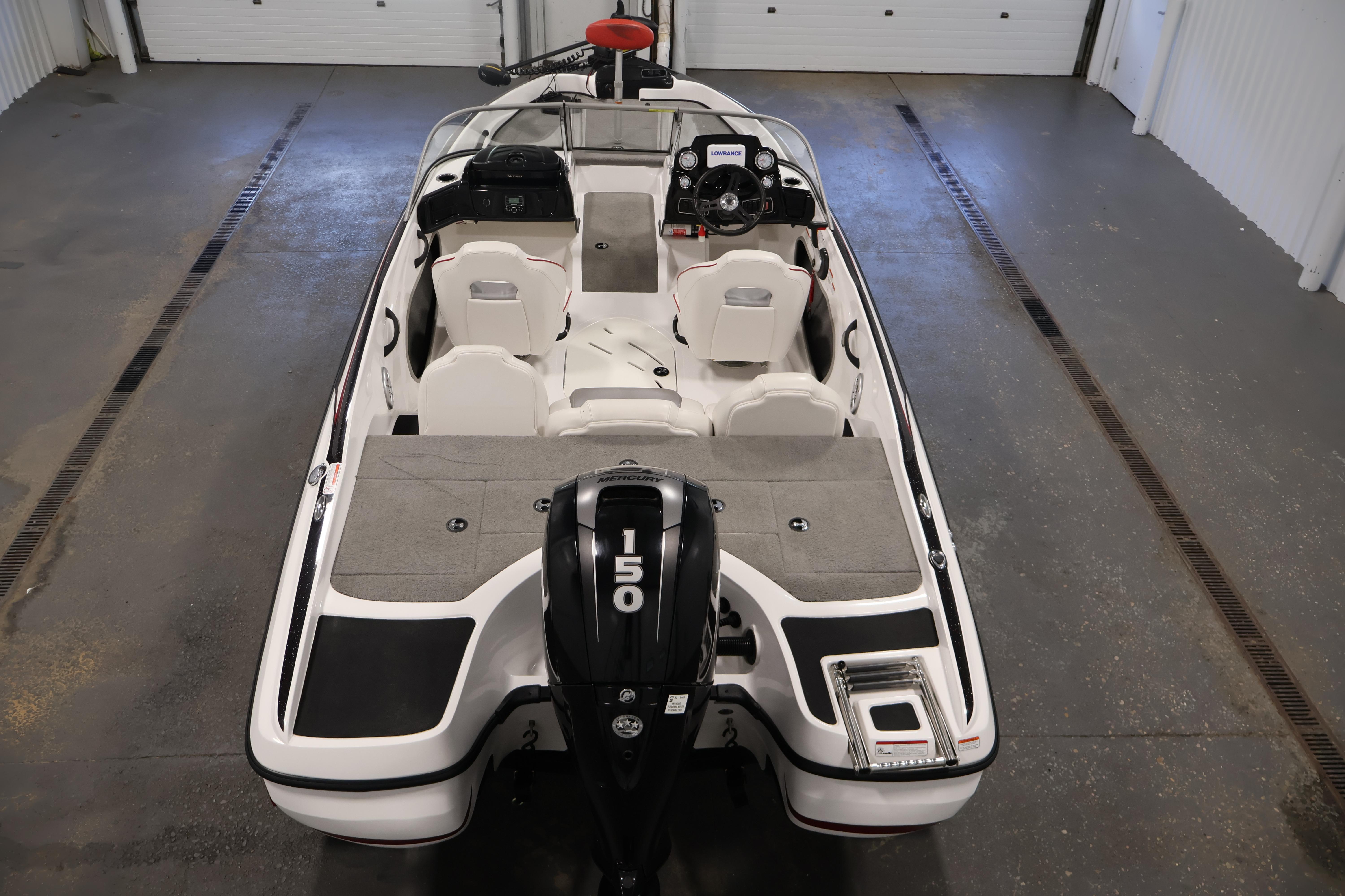 2019 Nitro Z19 Sport boat with 150 horsepower engine in a garage setting.