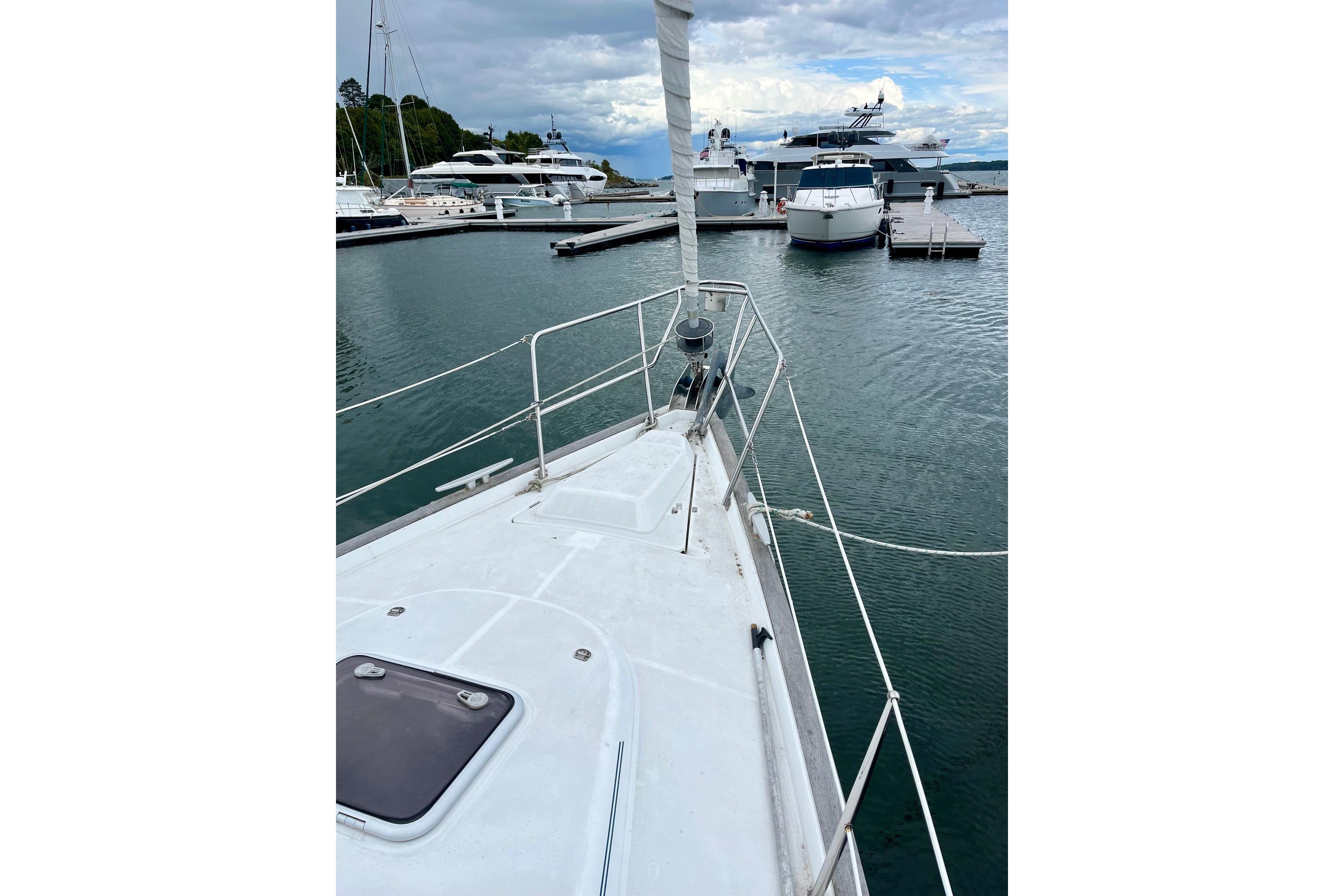 Beneteau Oceanis Clipper 423 sailboat docked in a marina, 2006 model.