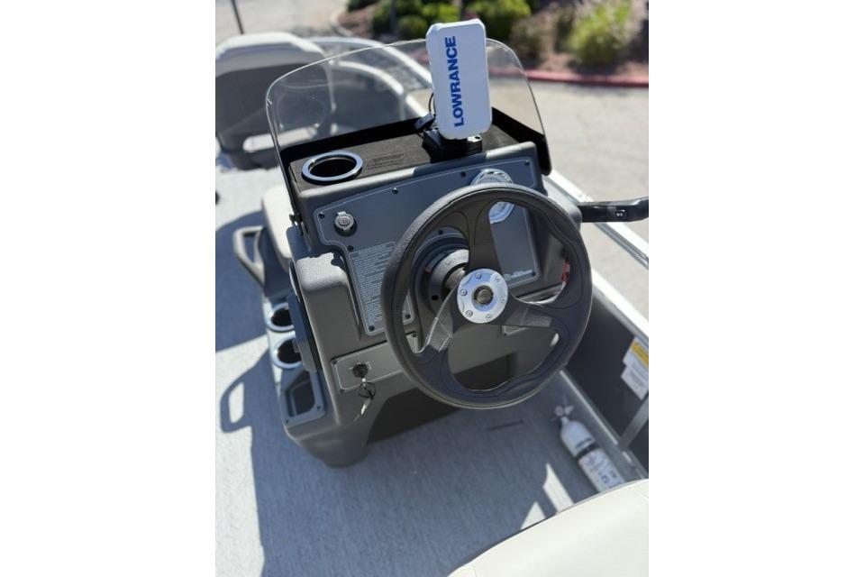 2026 Sun Tracker Bass Buggy 16 XL Select steering console with Lowrance device.