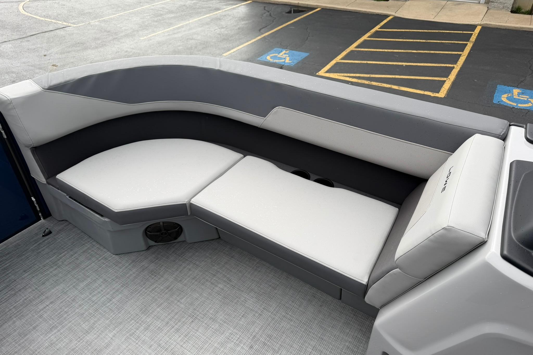 2026 Lowe LS 190 boat interior with gray cushioned seating and modern design.