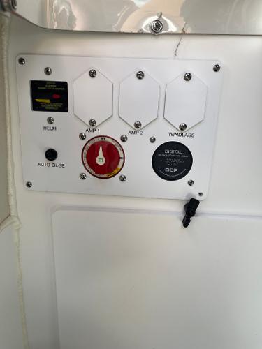 2024 Crownline Eclipse E255 control panel with switches and digital display.