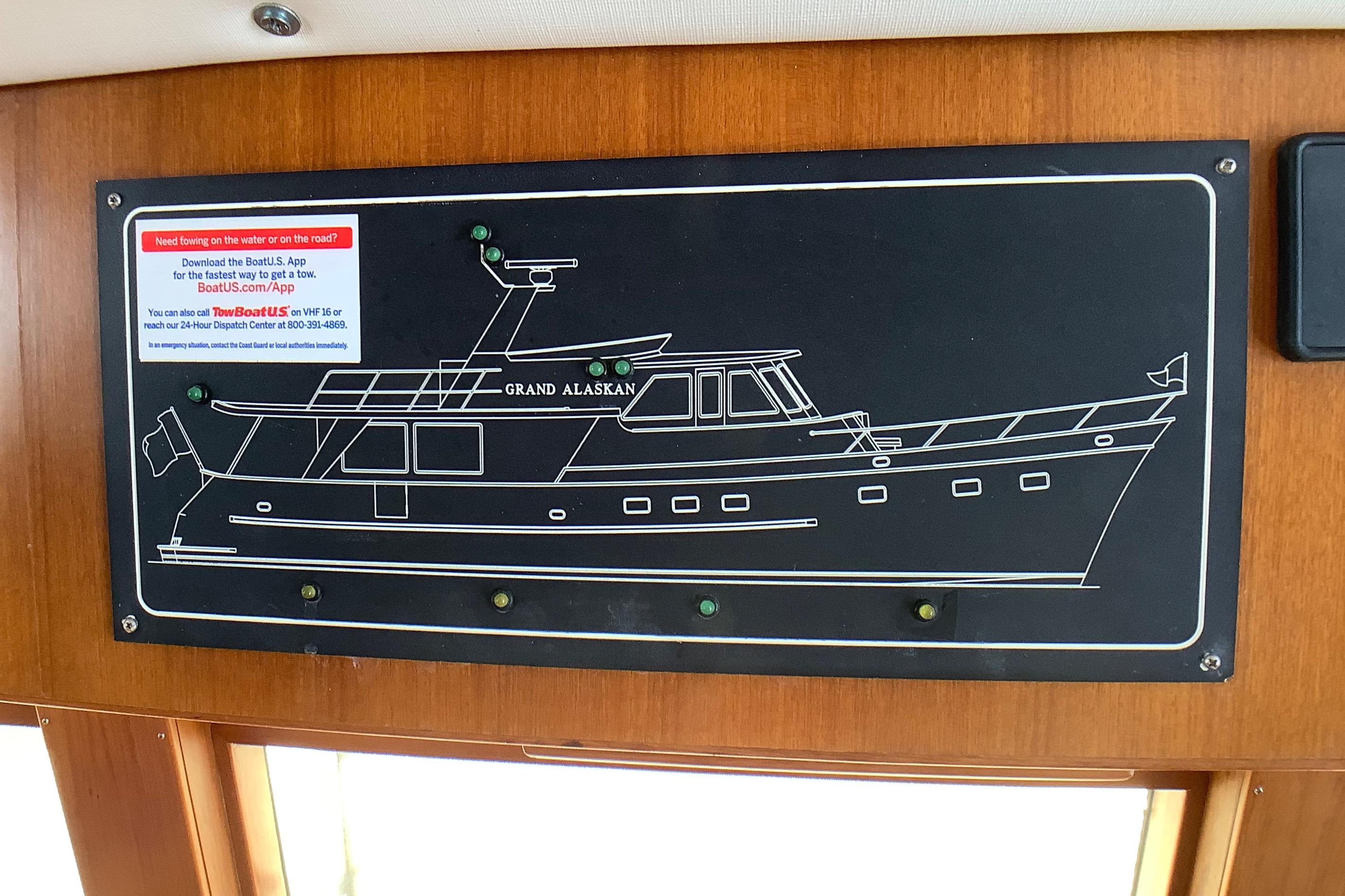 Diagram of a 1998 Grand Alaskan 60 Pilothouse yacht on a wooden panel.