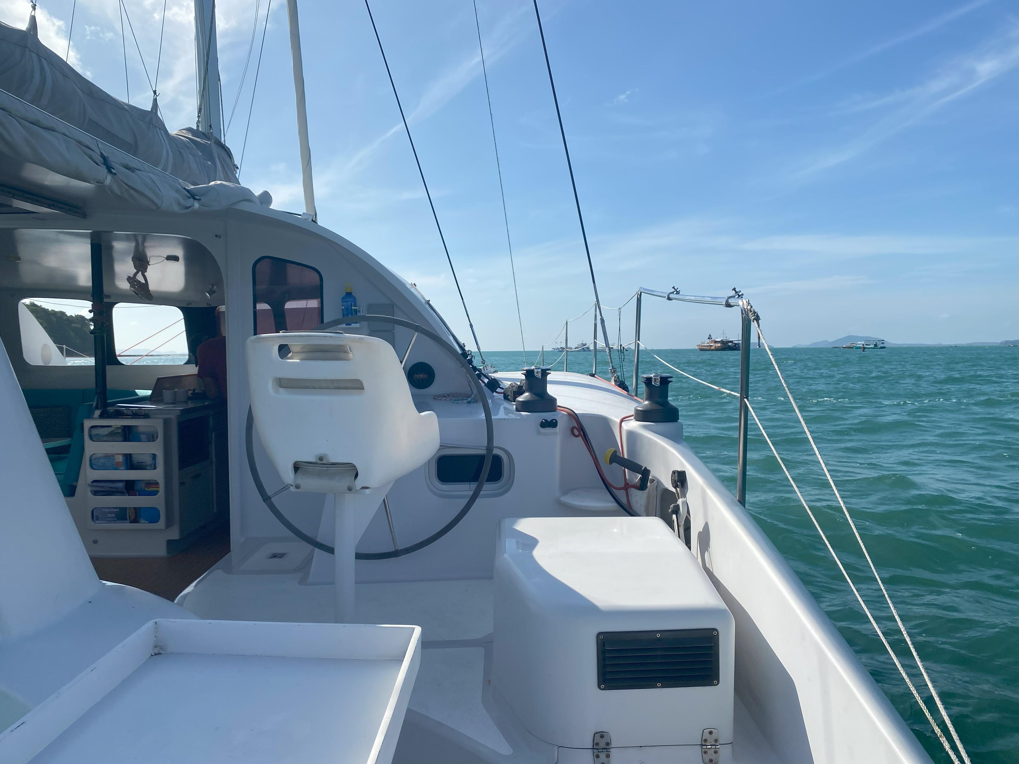 Sailing yacht Stealth 13C, 2016 model, cruising on a sunny day with clear skies.