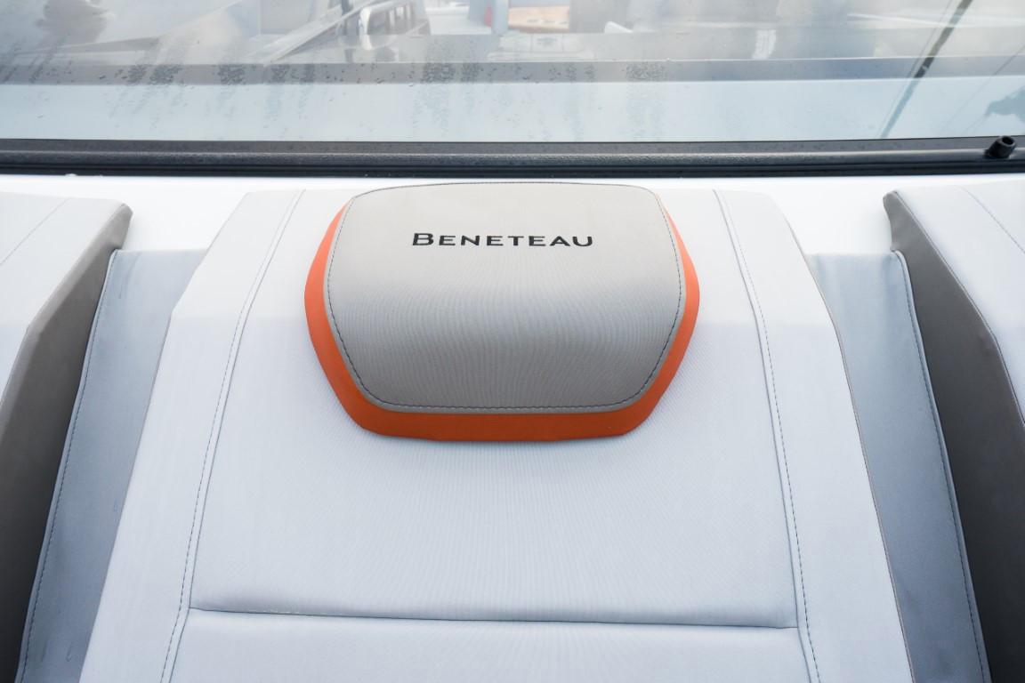 Beneteau Flyer 10 2024 boat seat with logo and orange trim.