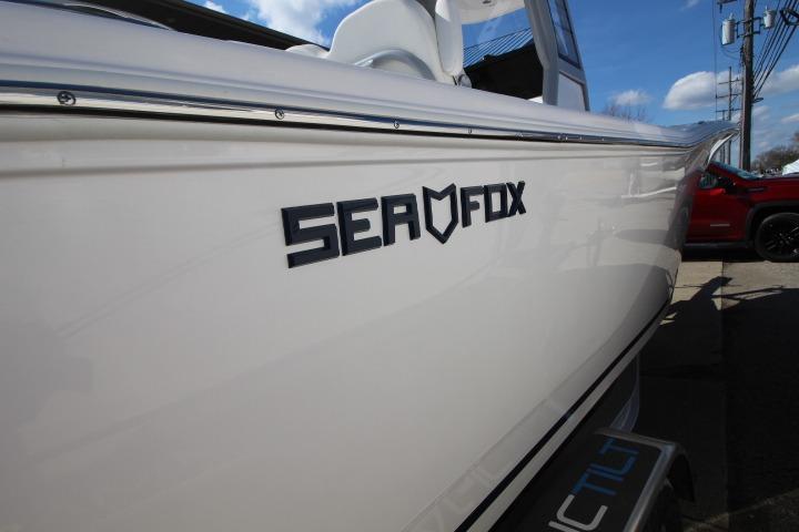 Sea Fox 248 Commander 2026 boat, side view with logo.